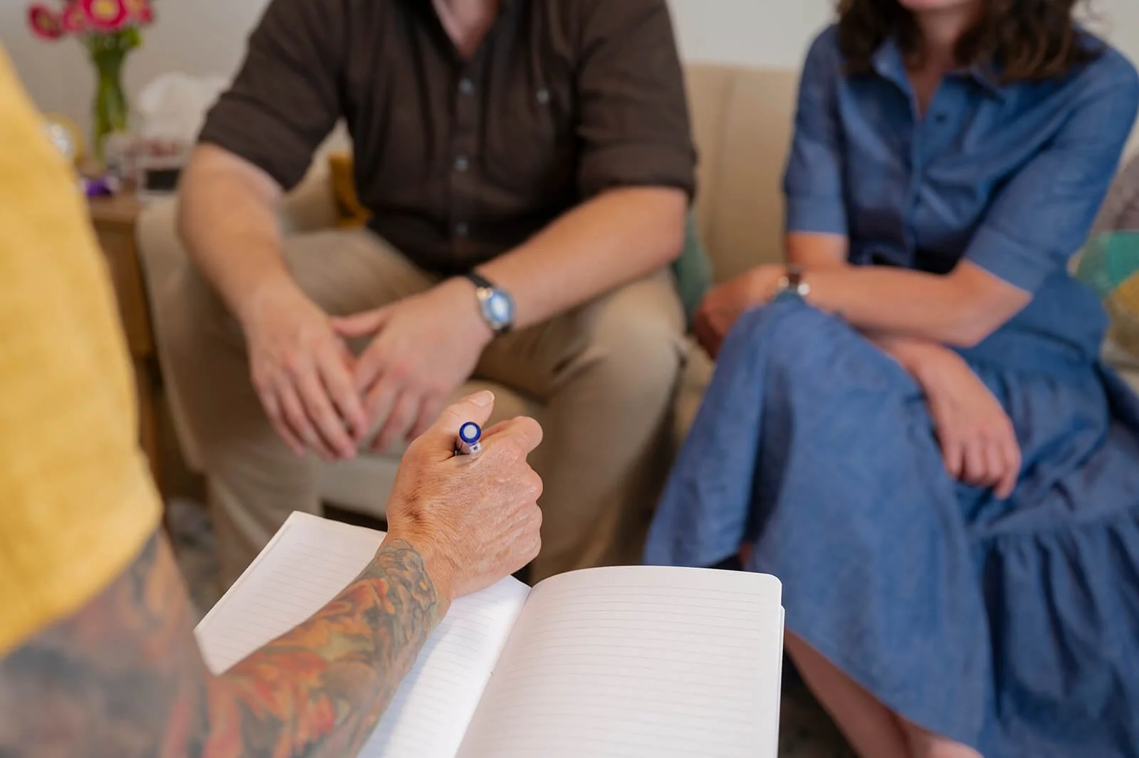 Deanna Smith RTC taking notes during a couples discernment therapy session