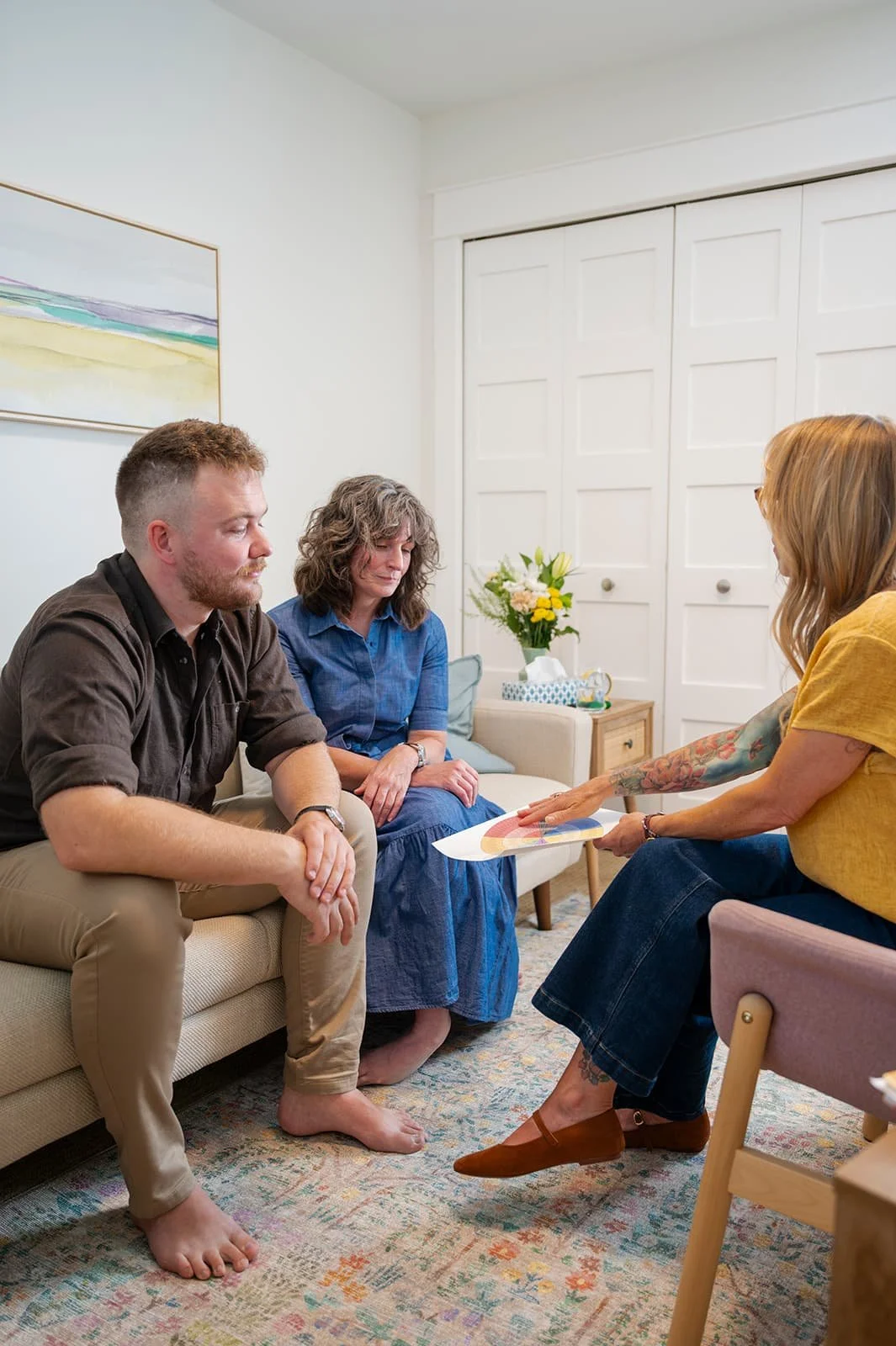 horizontal image of a couple discussing relationship issues durign a discernment counselling session in Nanaimo, BC