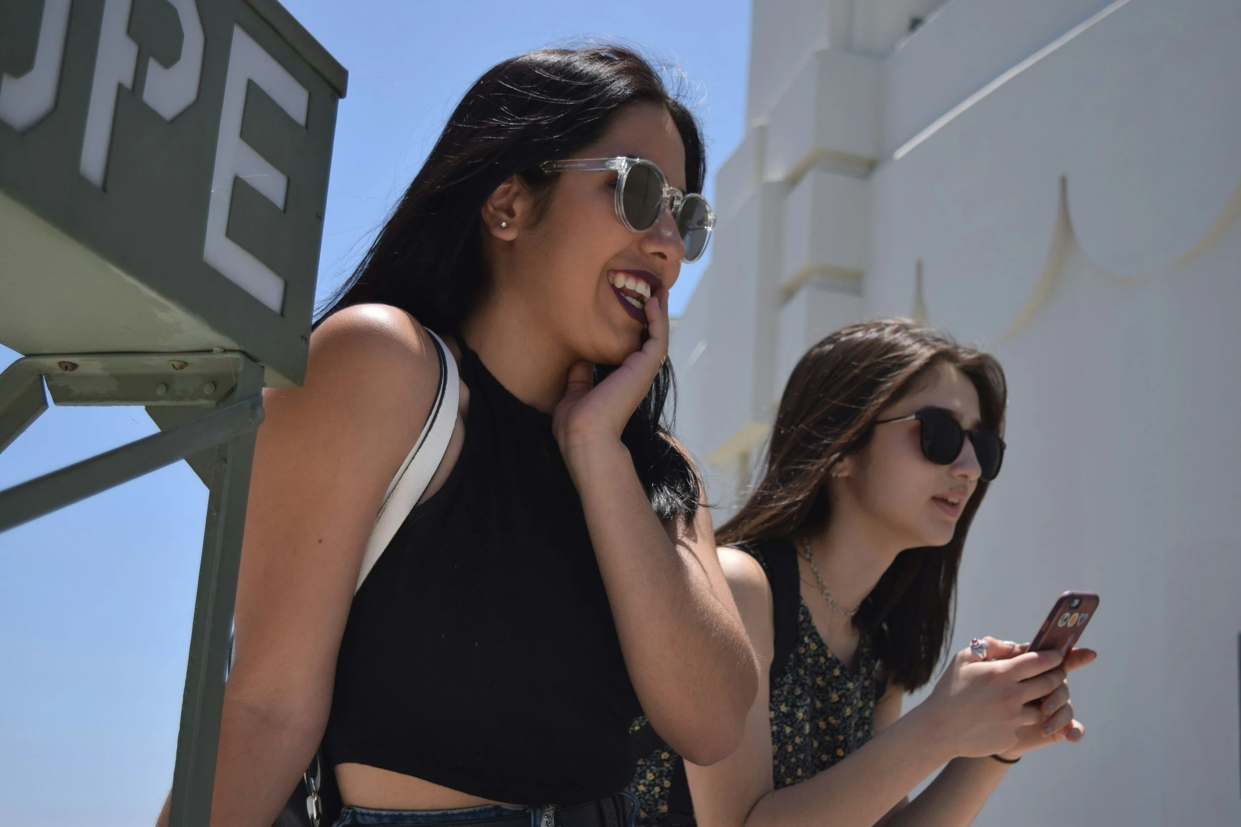 two Autistic teen girls standing together