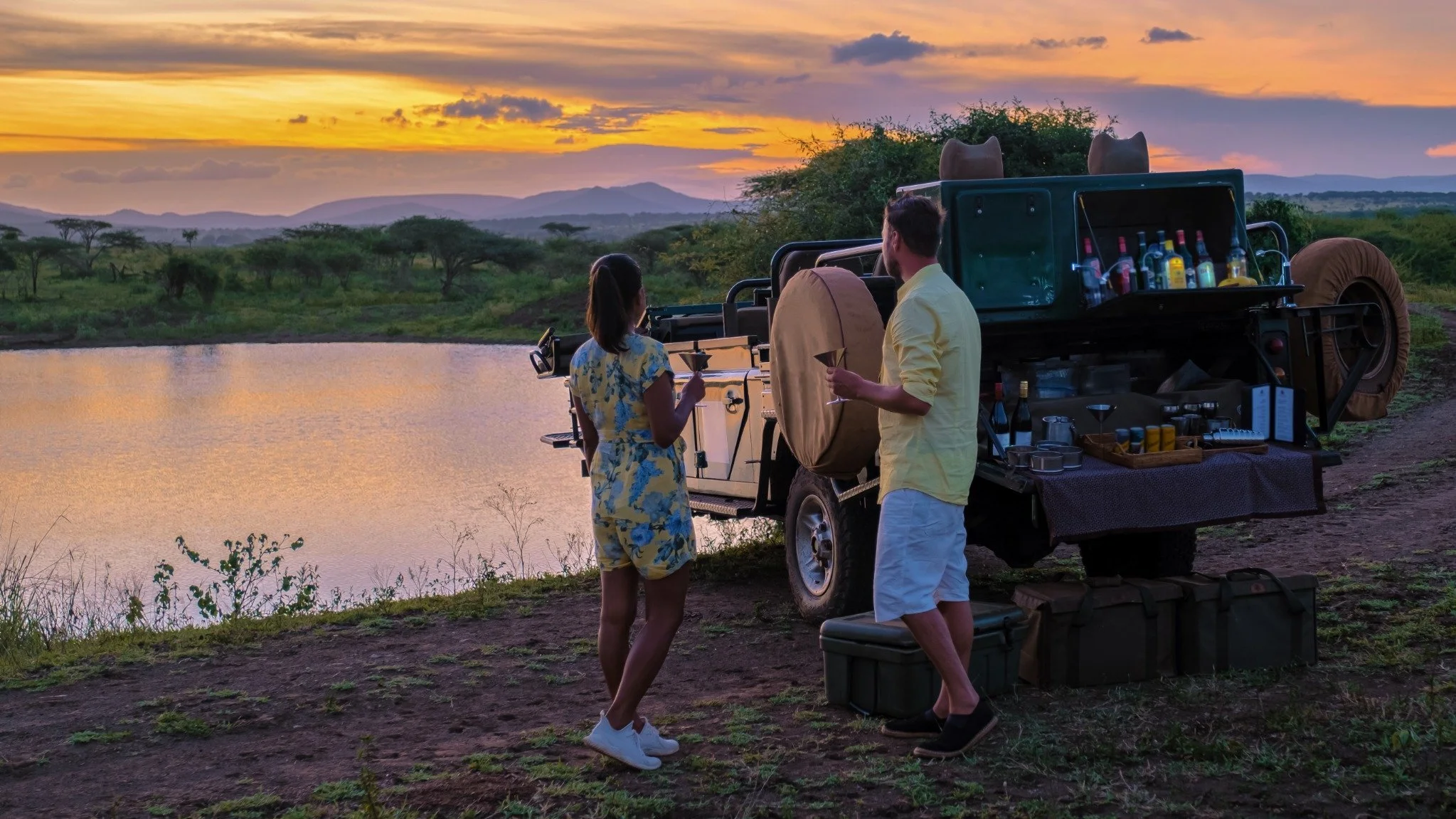 couple-safari-sundowner-south-africa-orange-moon-travel.jpg