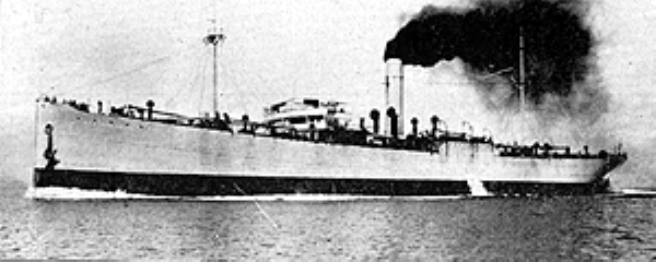 A black and white photo of a large ship on water with smoke coming from its smokestack, suggesting it is in operation.
