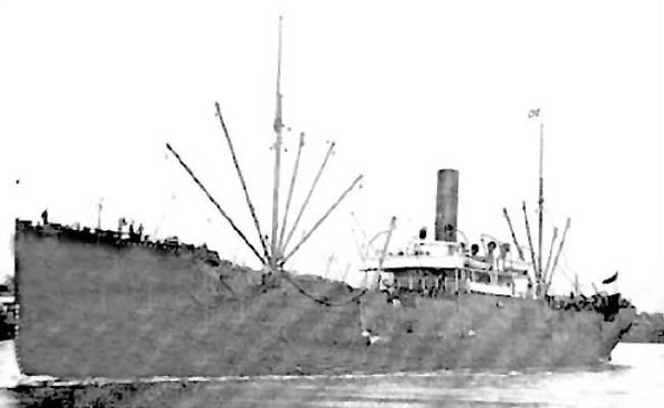 A vintage black and white photograph of a large ship used in World War I, with a single smokestack, masts, and rigging.
