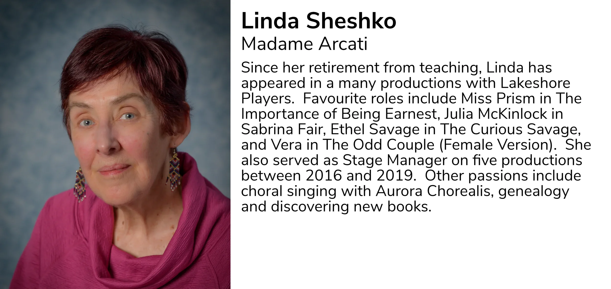 A portrait of Linda Sheshko, an older woman with short reddish-brown hair, wearing a pink top and colorful earrings, against a blurred blue background.