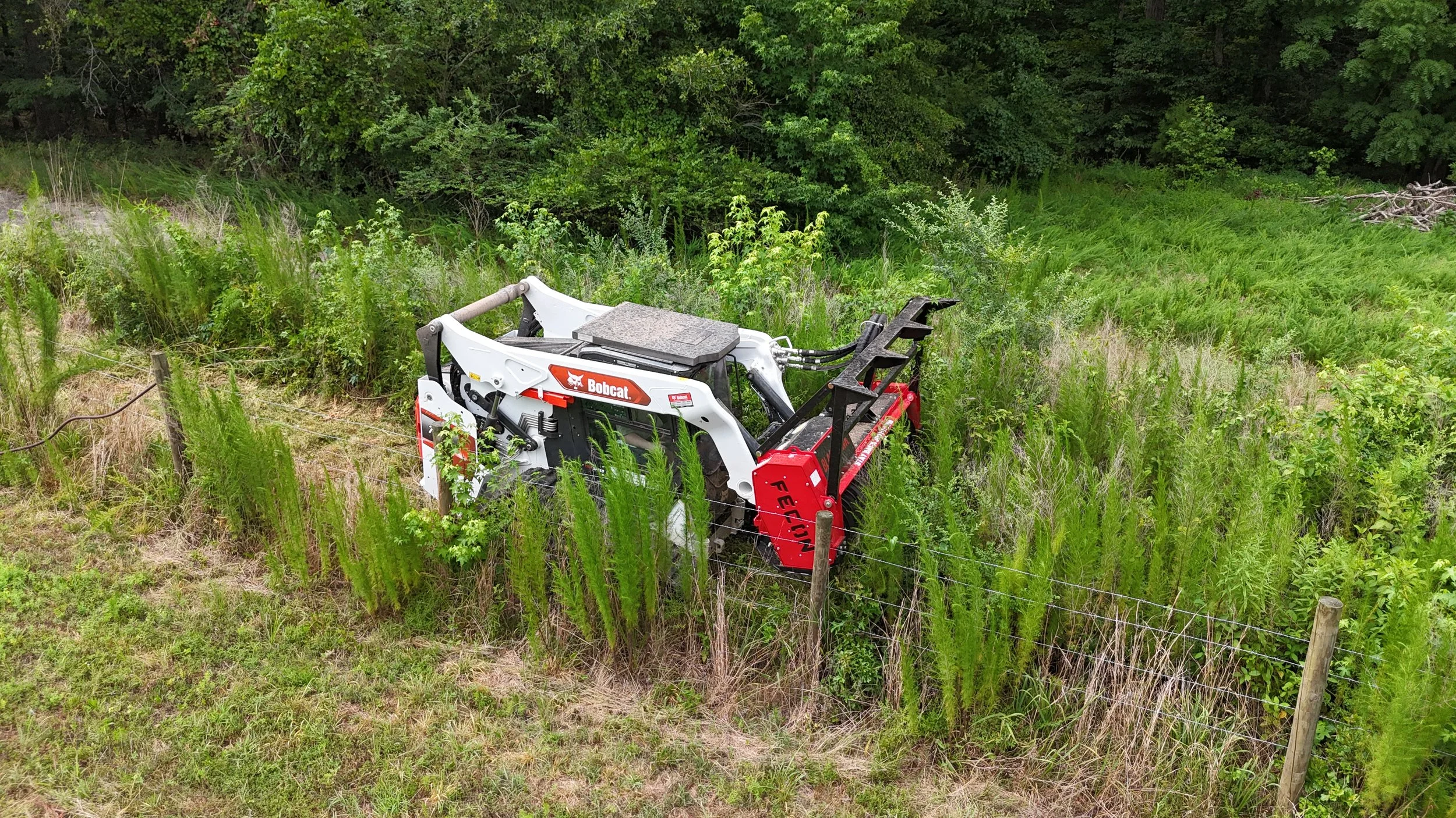 Professional lot clearing, underbrush removal, and property cleanup services for residential, commercial, hunting, and agricultural land.