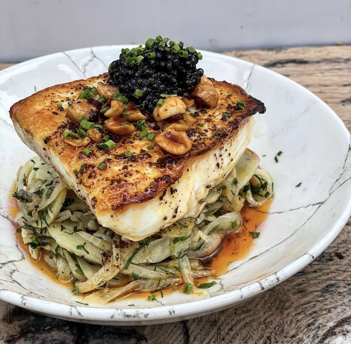 Steamed halibut, fennel, hazelnut brown butter, caviar