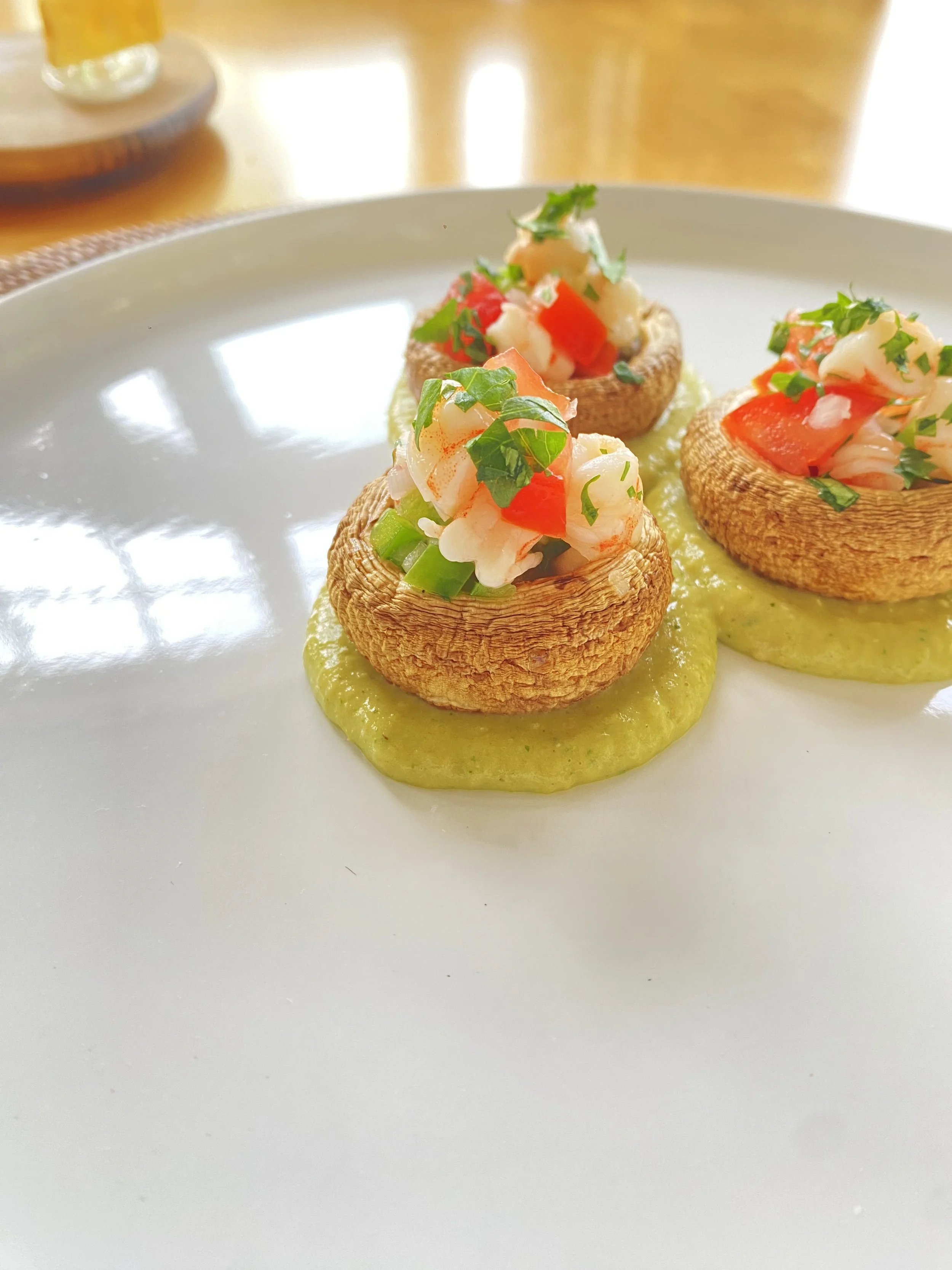 Ceviche stuffed mushrooms in tomatillo salsa