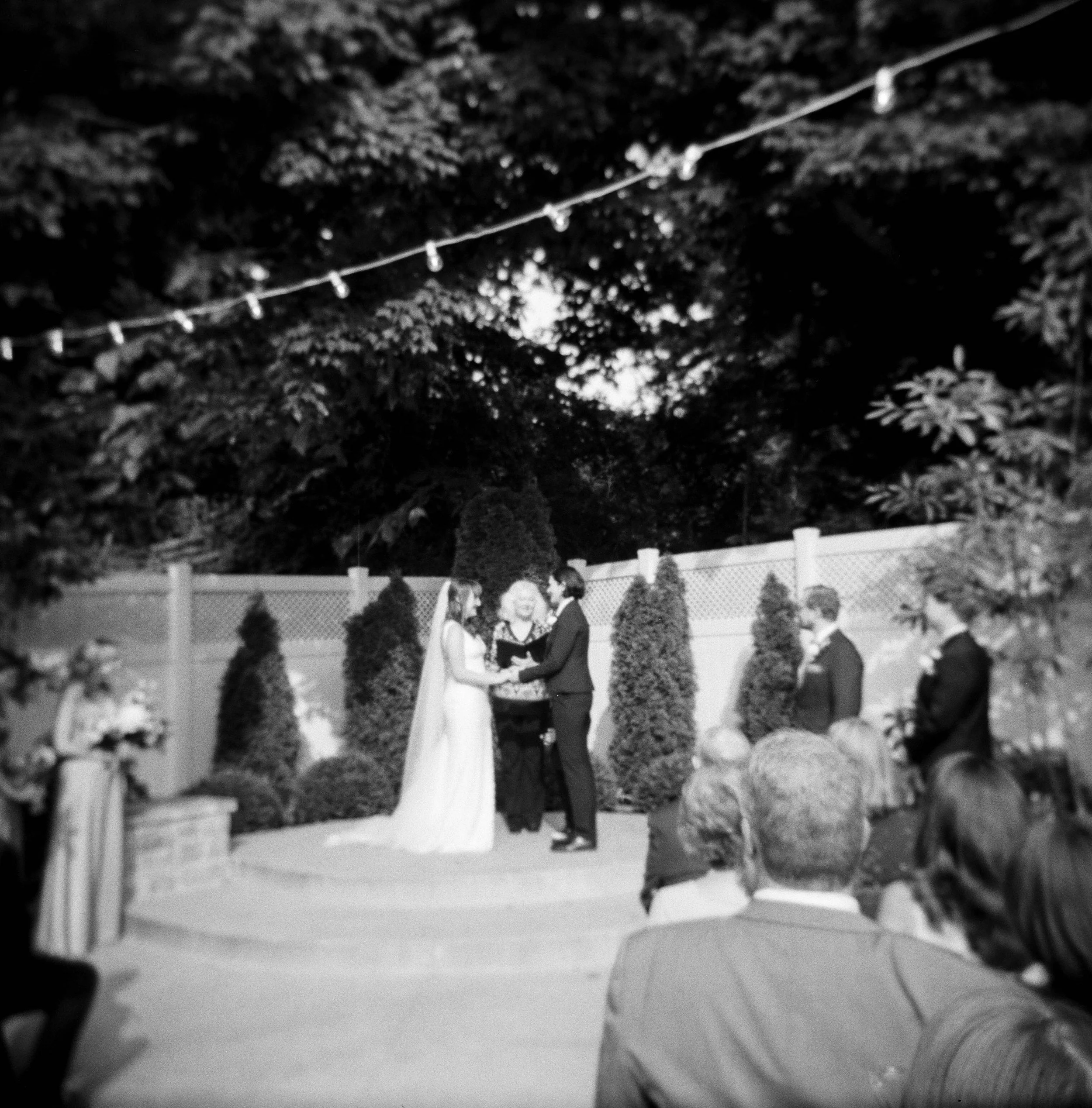 HRF42-black-white-holga-brides-at-wedding-ceremony.jpg