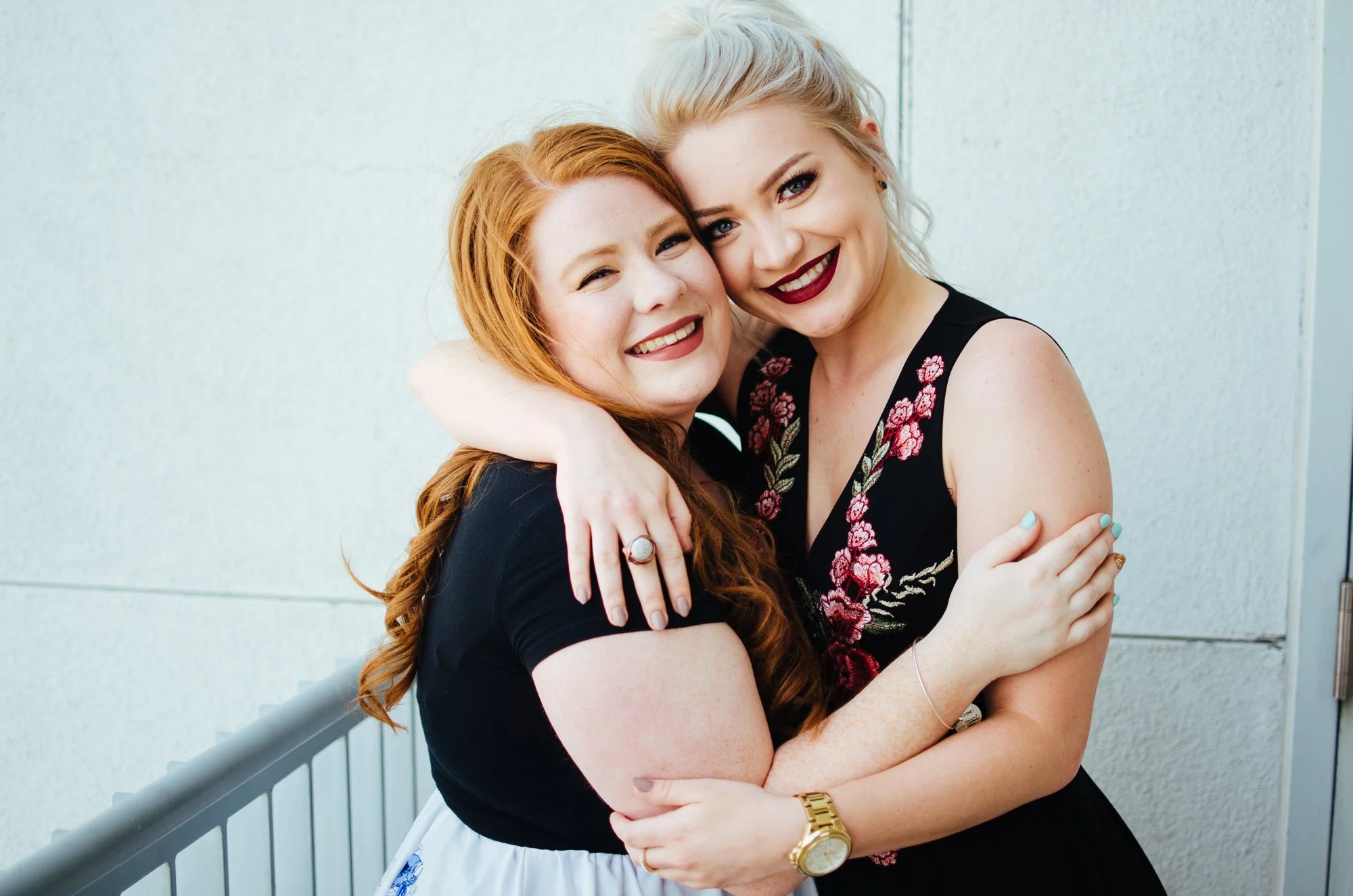 BT49-two-sisters-smiling-hugging.jpg