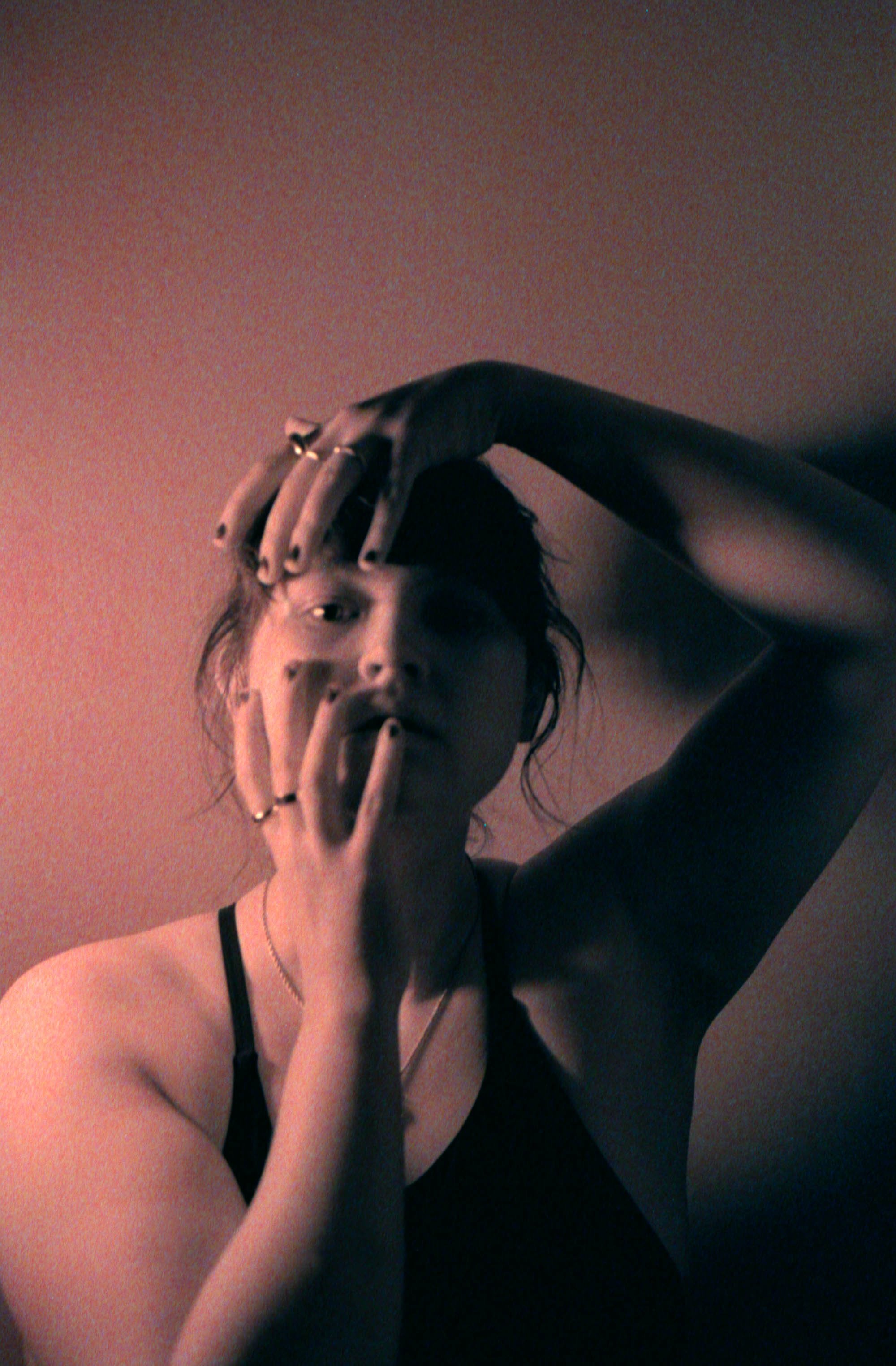 week-34-woman-in-shadow-with-hands-on-face.jpg