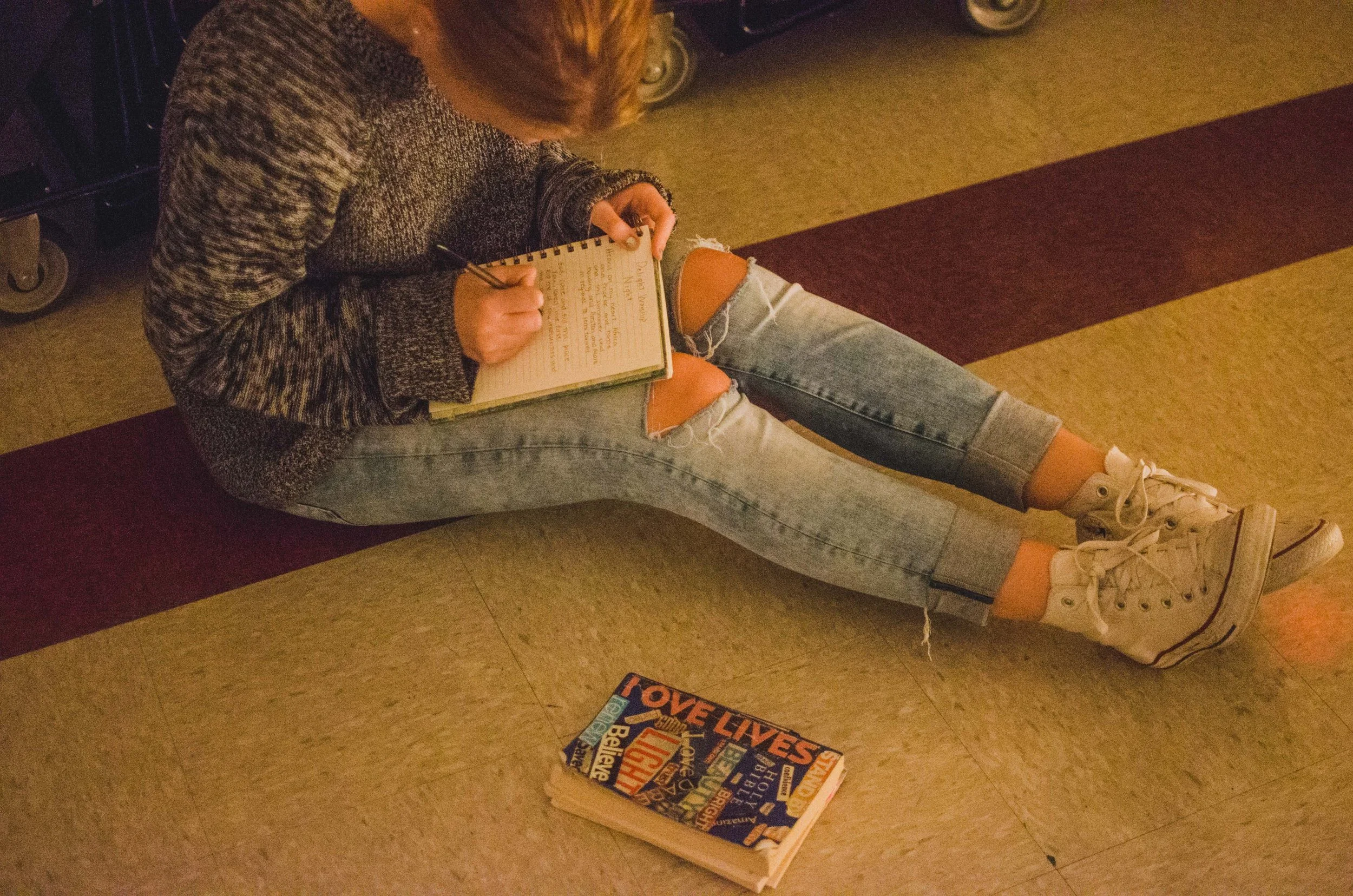 d119-woman-journaling-on-ground.jpg