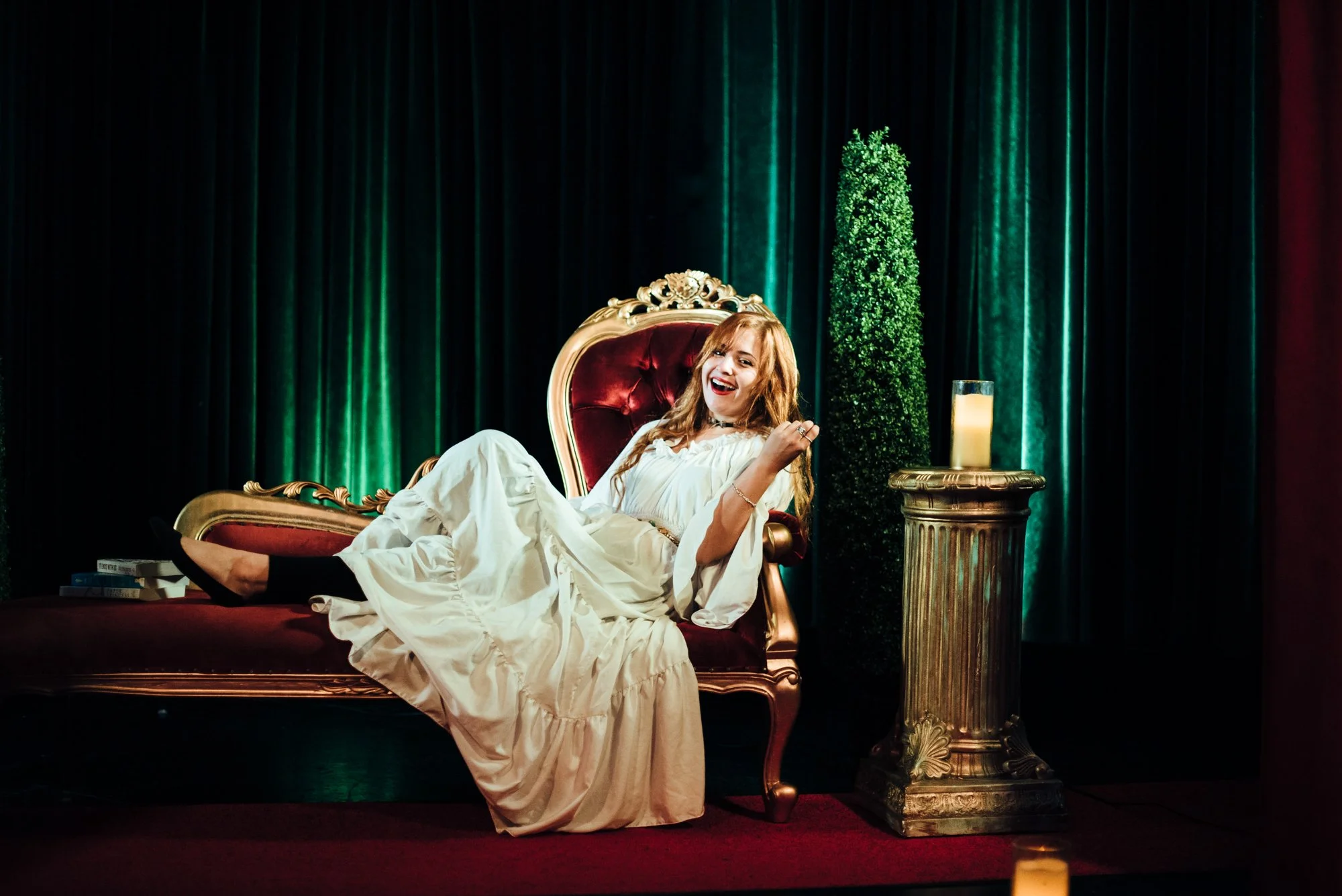 BT181-woman-in-white-dress-lounging-on-sofa.jpg