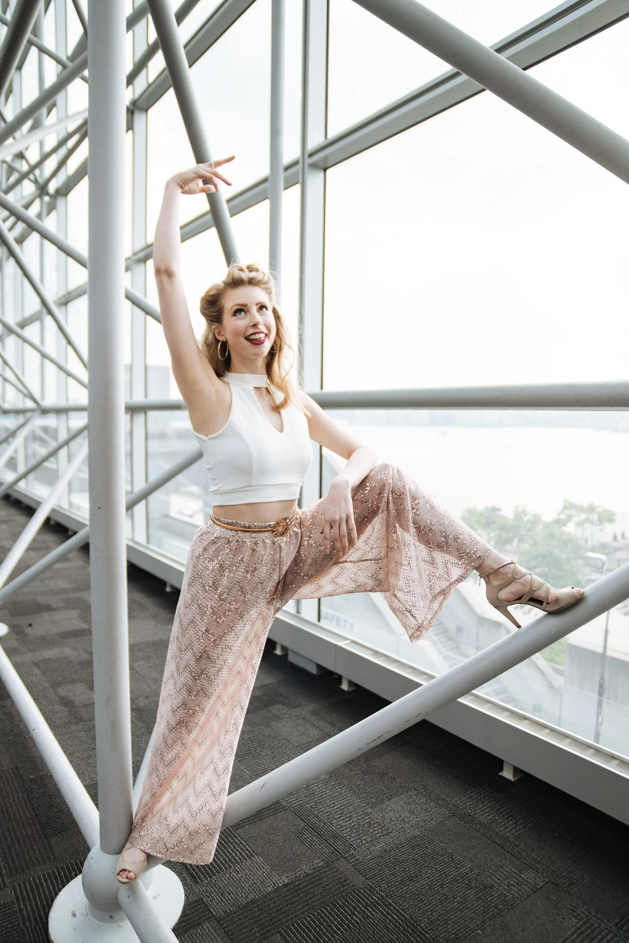 BT448-christine-riccio-posing-on-railing.jpg