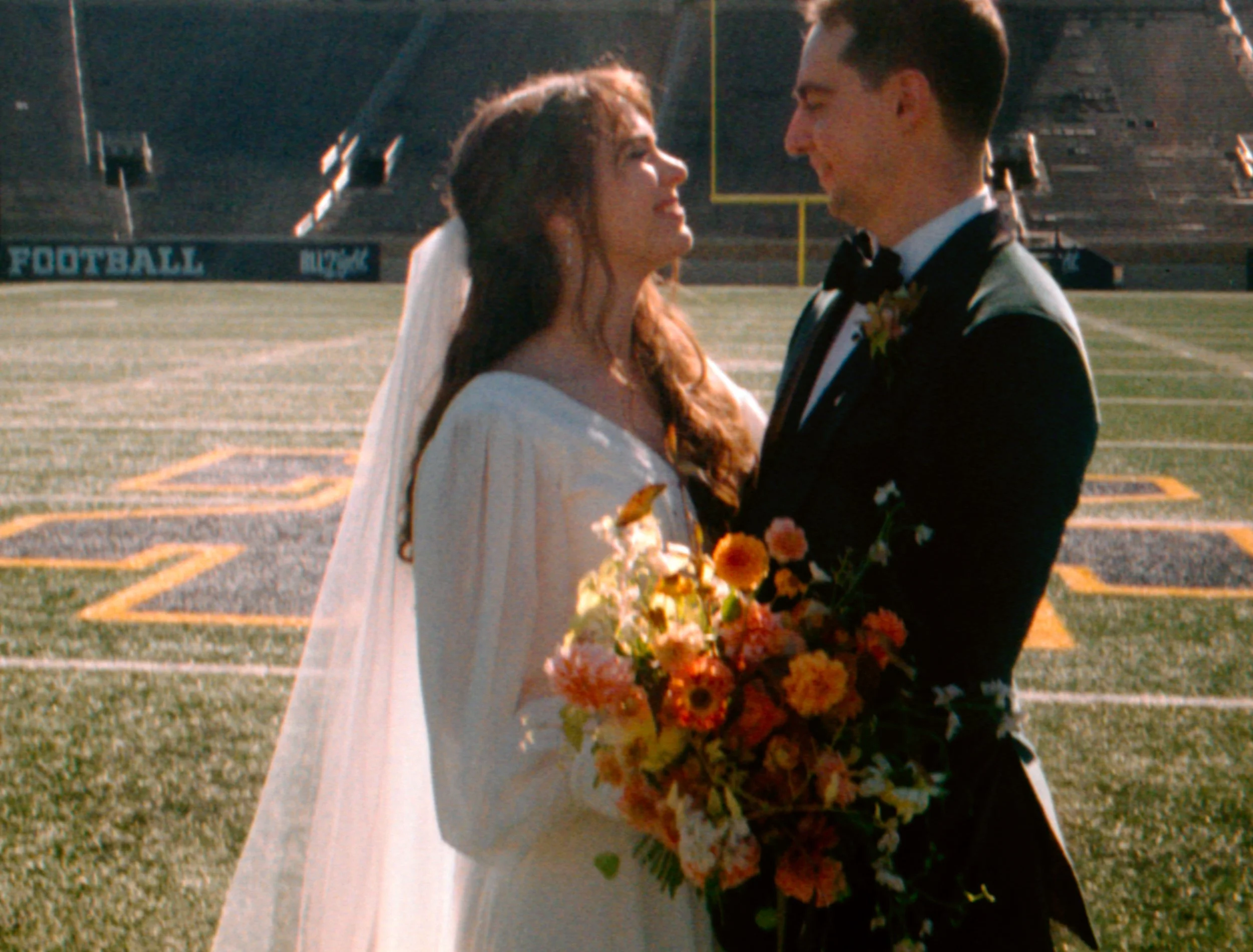 LBW53-bride-smiling-at-groom-notre-dame-university.jpg