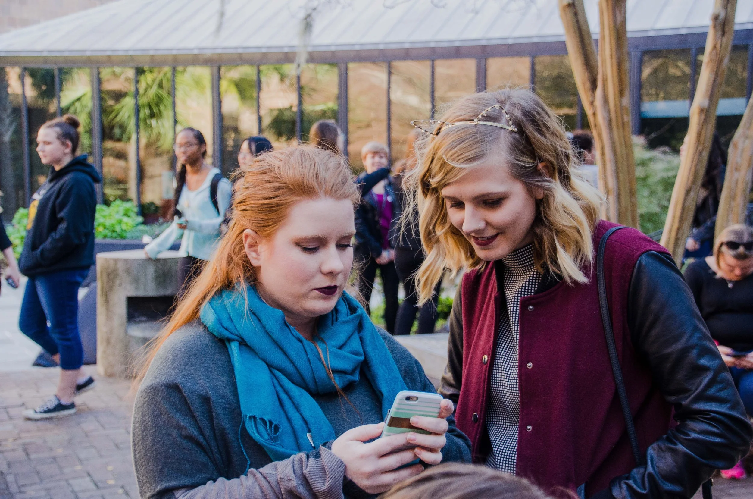 BT13-white-women-looking-at-phone.jpg