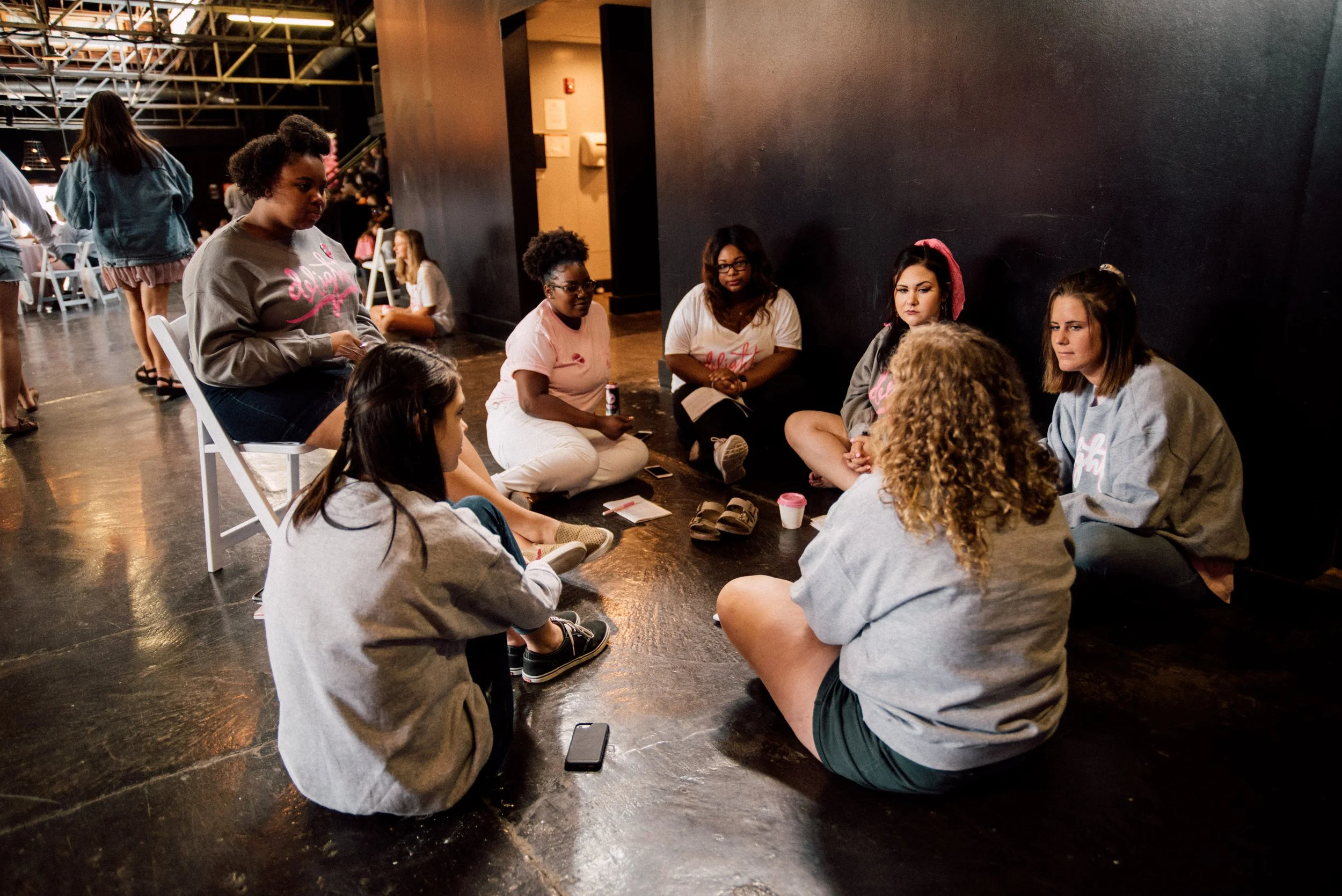 d302-women-in-circle-talking-conference.jpg