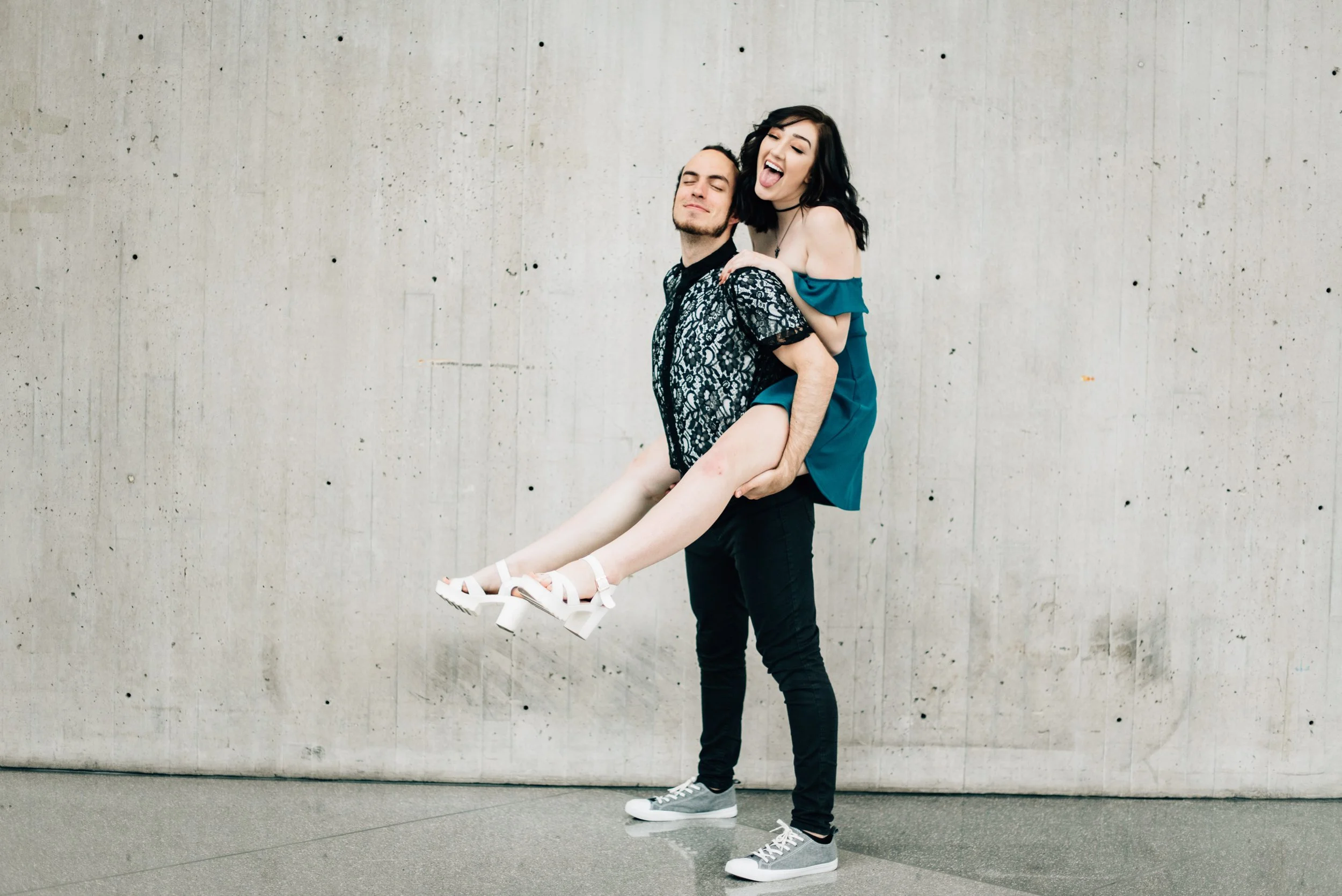 BT108-man-with-woman-on-back-smilng.jpg
