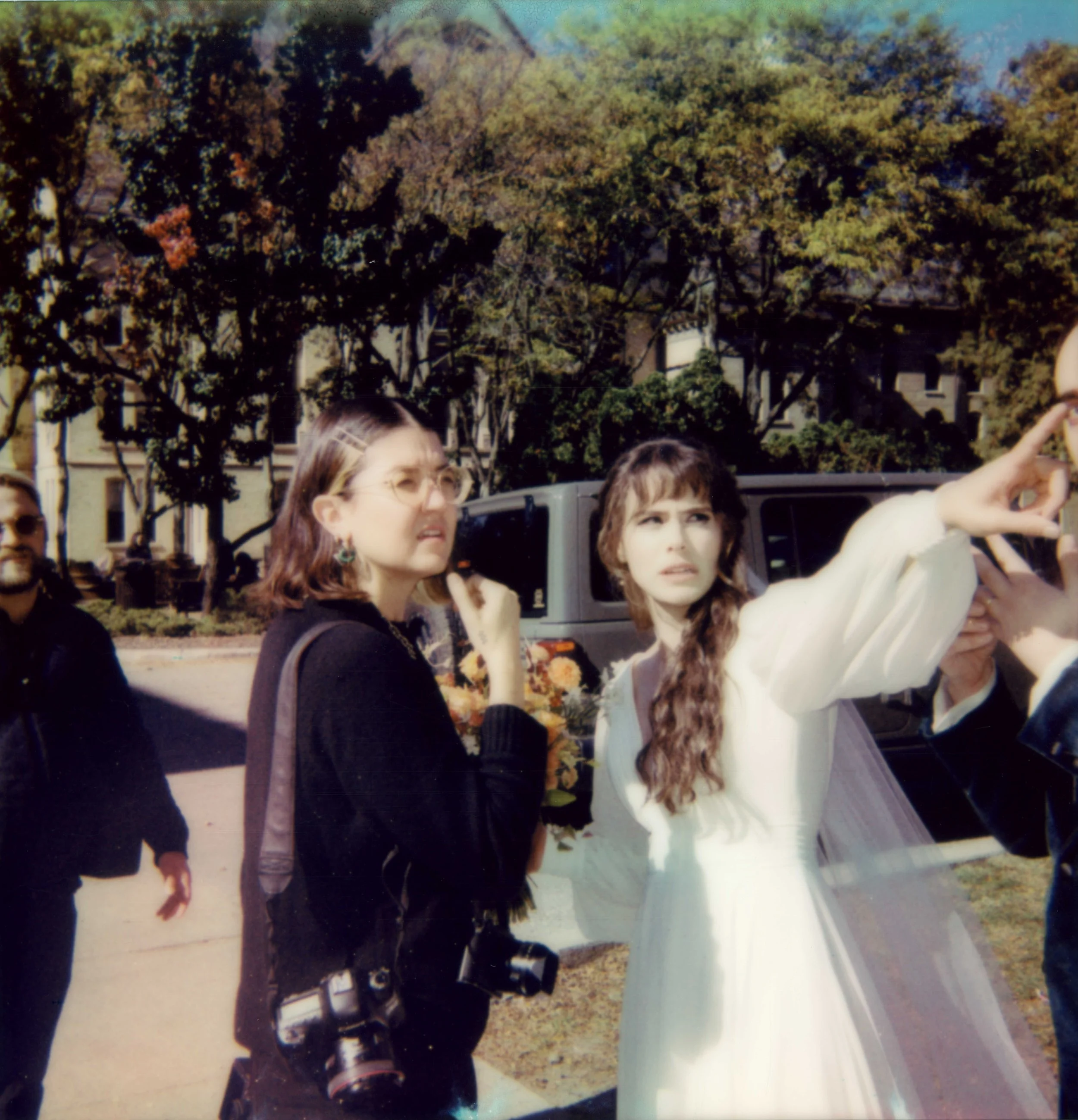 LBW18-bride-gesturing-for-photographer-polaroid.jpg