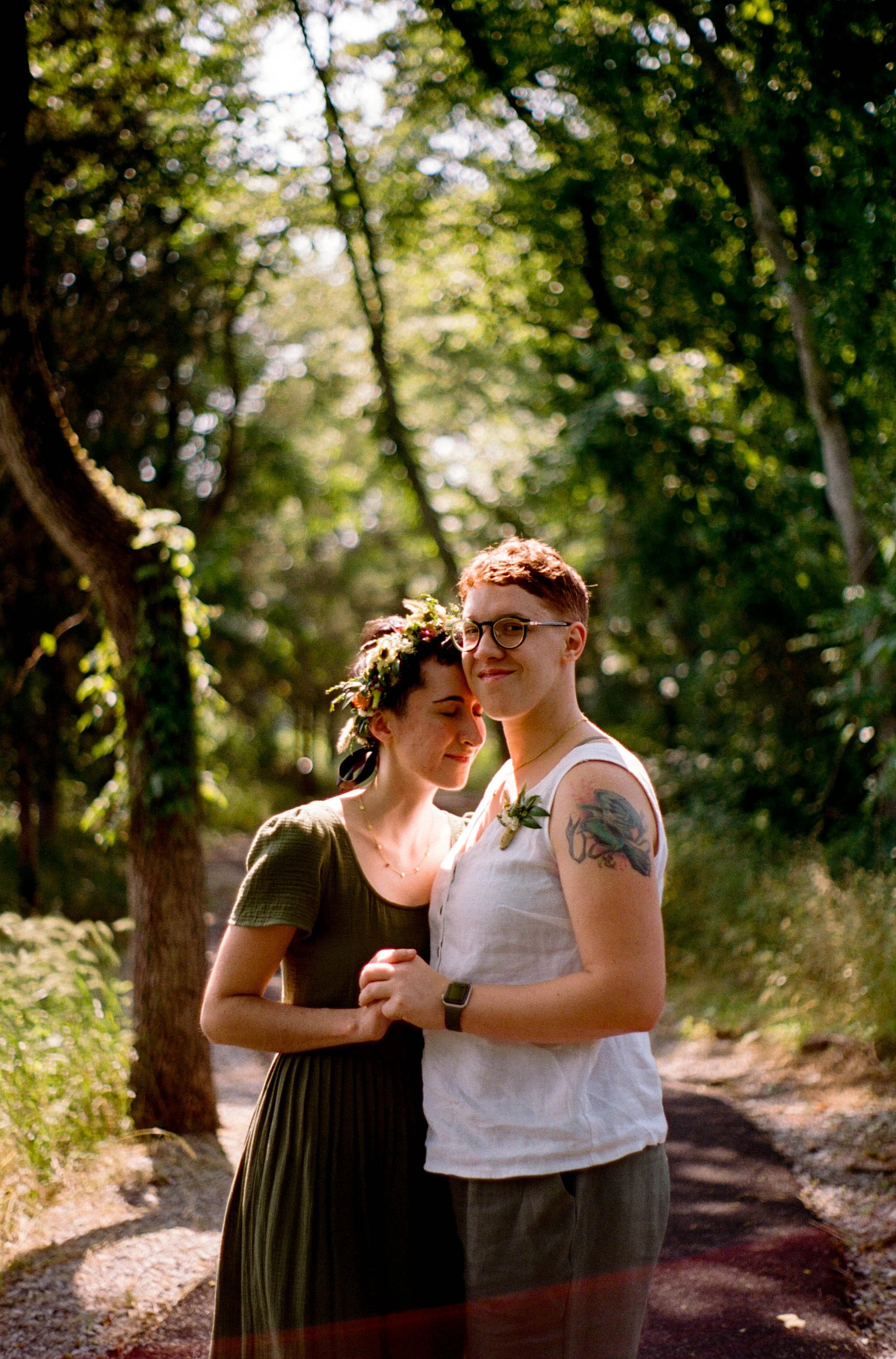 REW08-woman-eyes-closed-holding-woman.jpg
