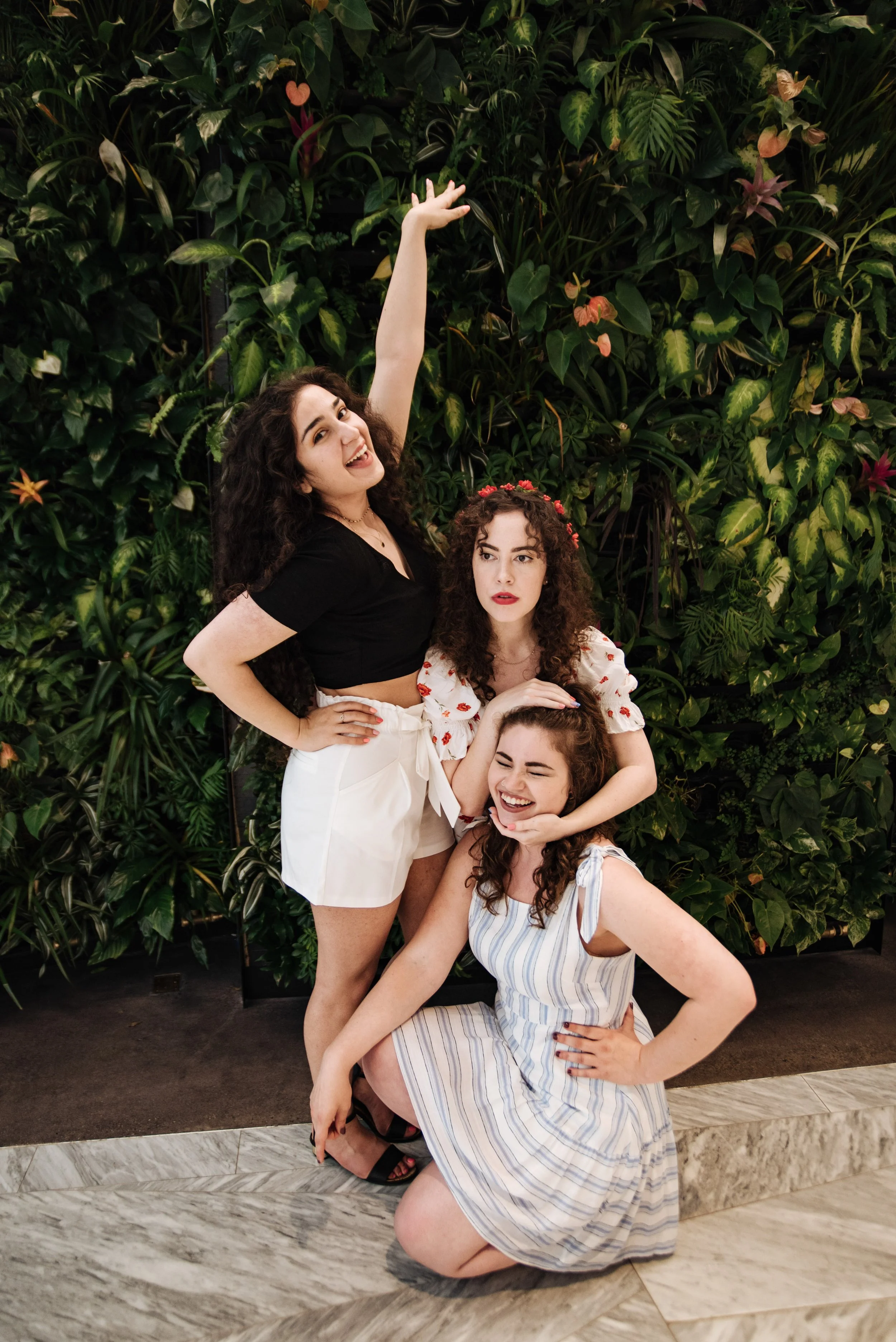 BT248-three-women-posing-in-greenery-leaves.jpg