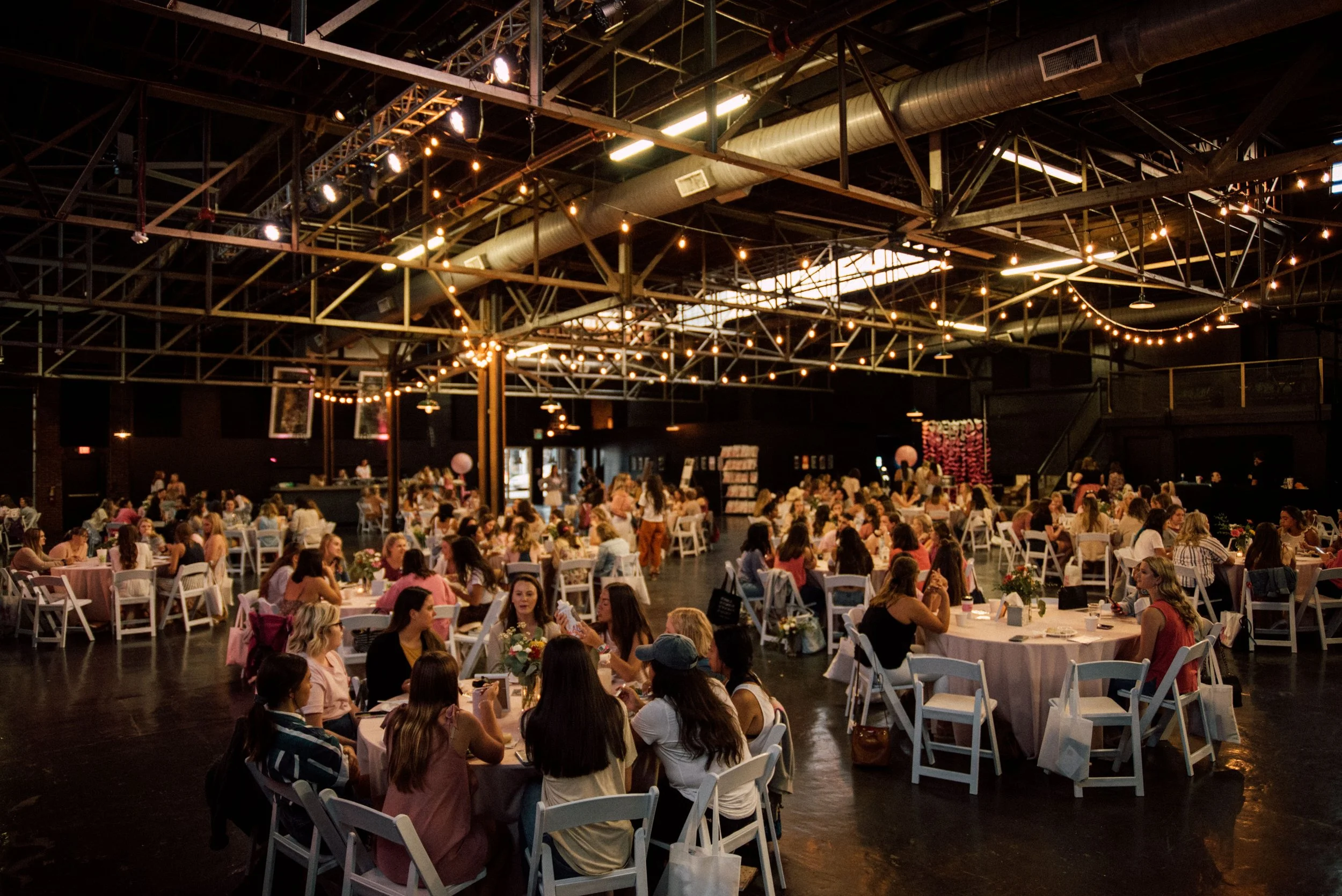 d294-women-at-tables-conference.jpg