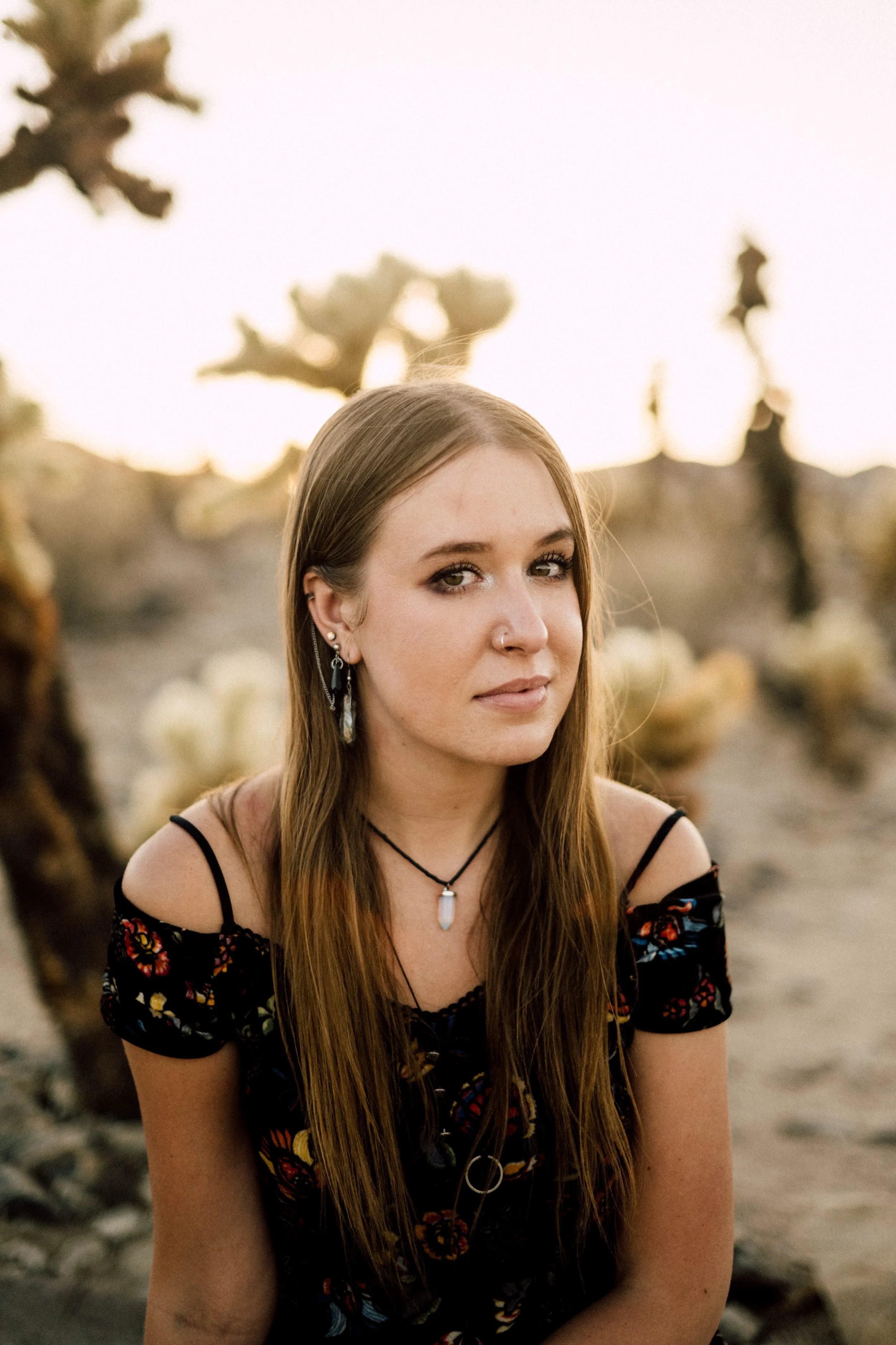BT41-woman-sitting-joshua-tree-sunset.jpg