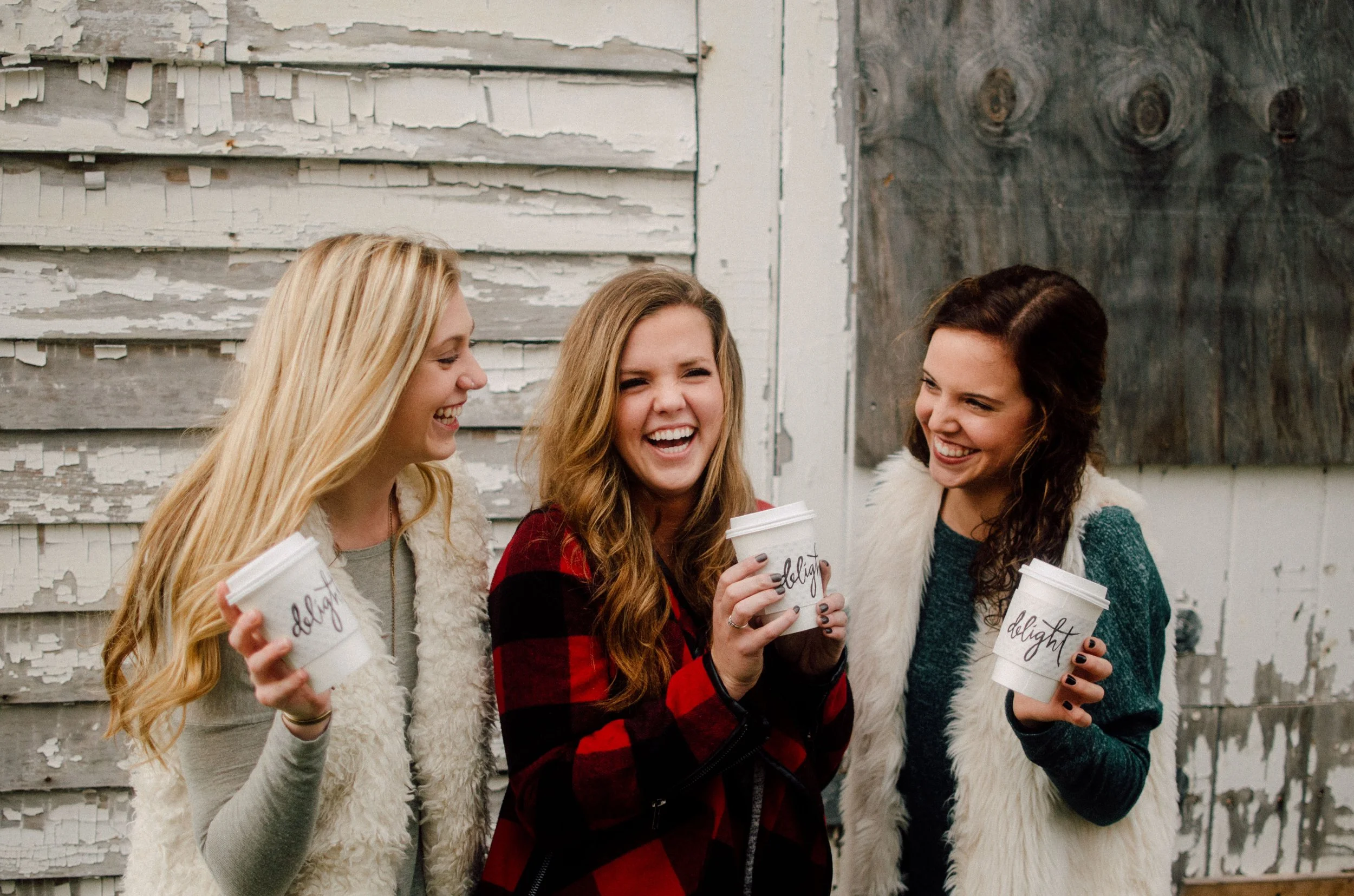 d127-women-holding-coffee-cups.jpg