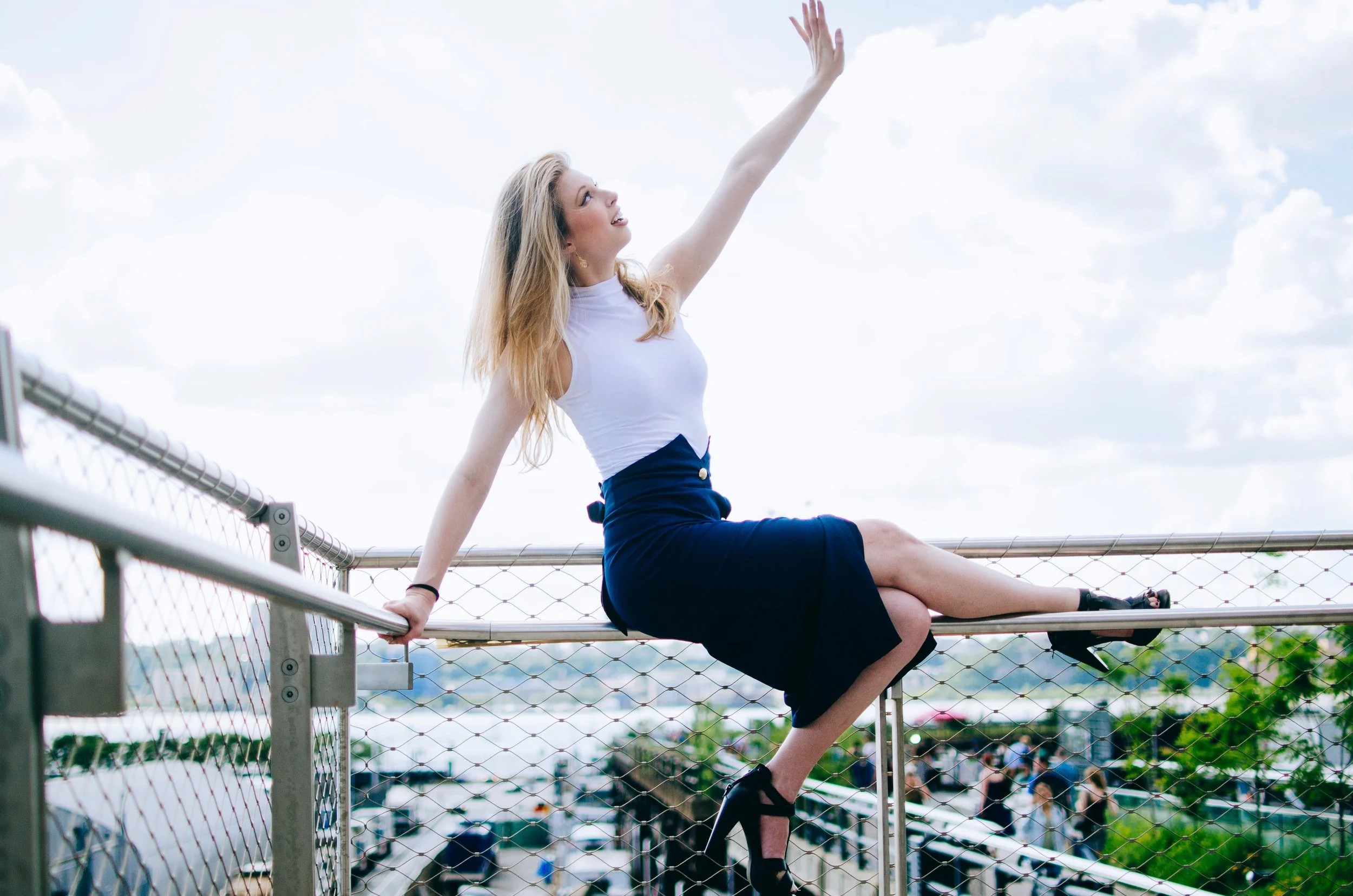 BT155-christine-riccio-sitting-on-railing-high-line-nyc.jpg