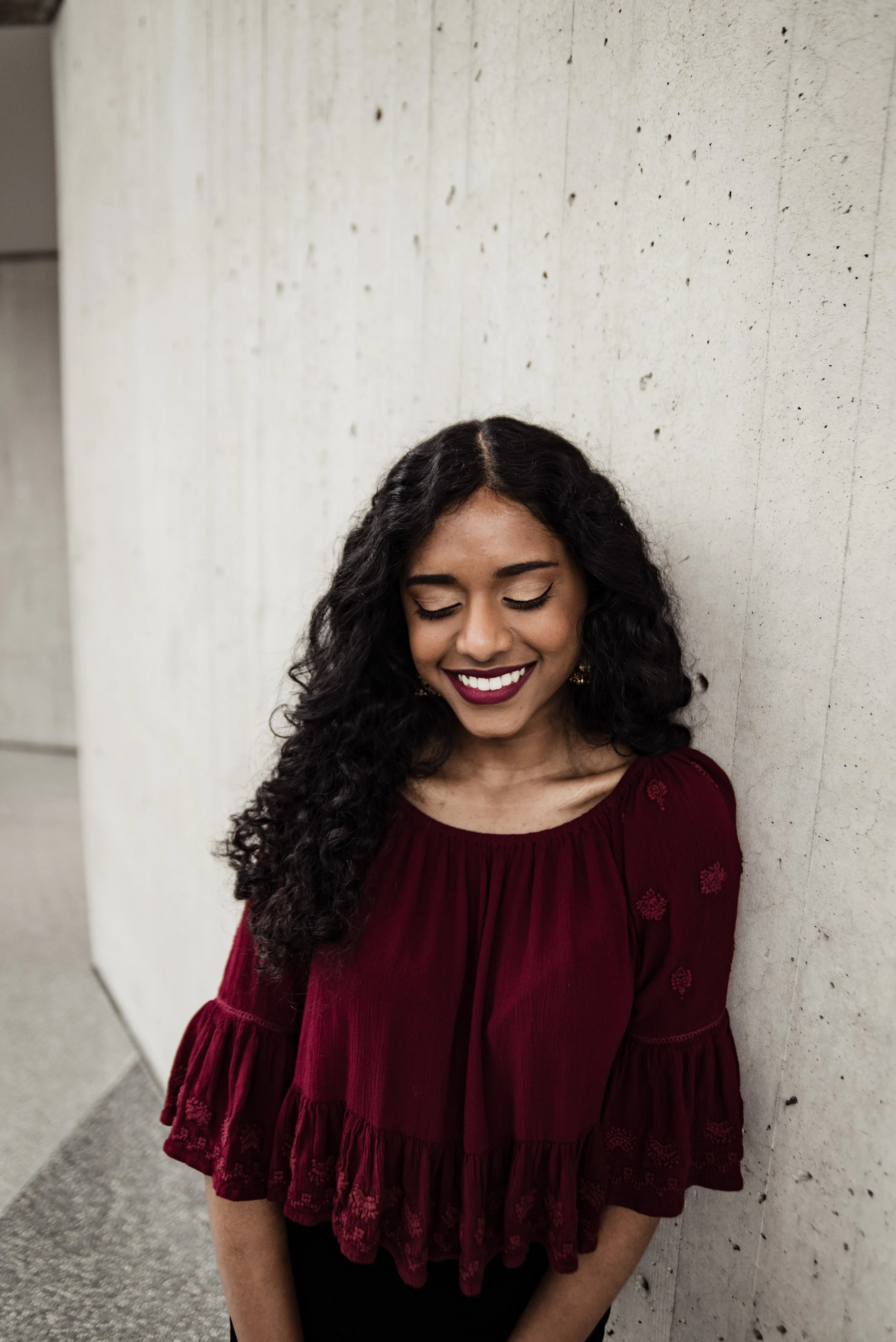 BT300-woman-looking-down-smiling.jpg