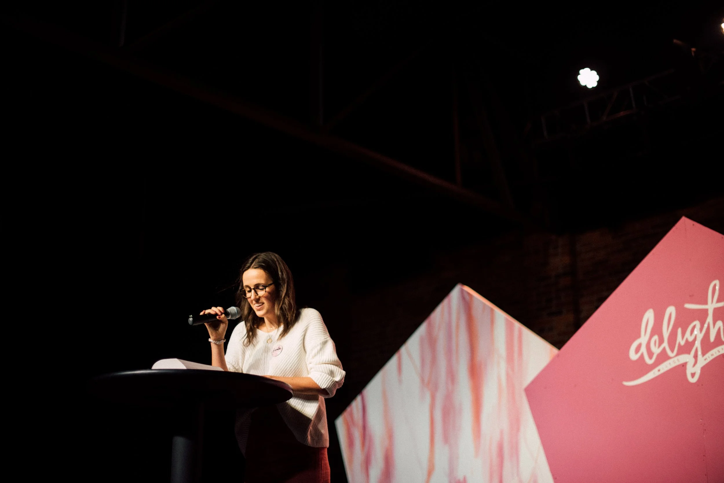 d256-woman-speaking-at-conference.jpg