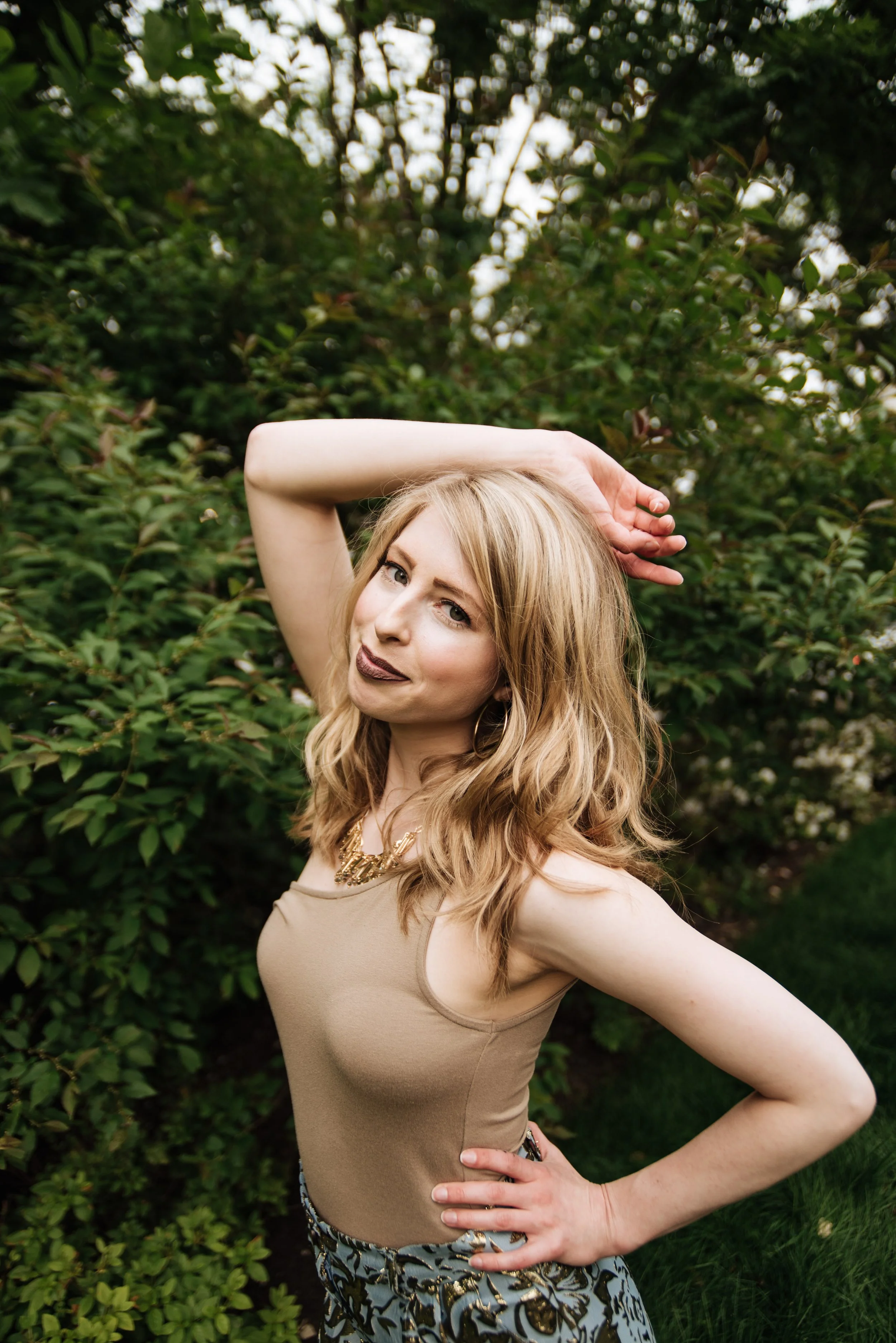 BT365-blonde-woman-hand-over-head-smiling.jpg