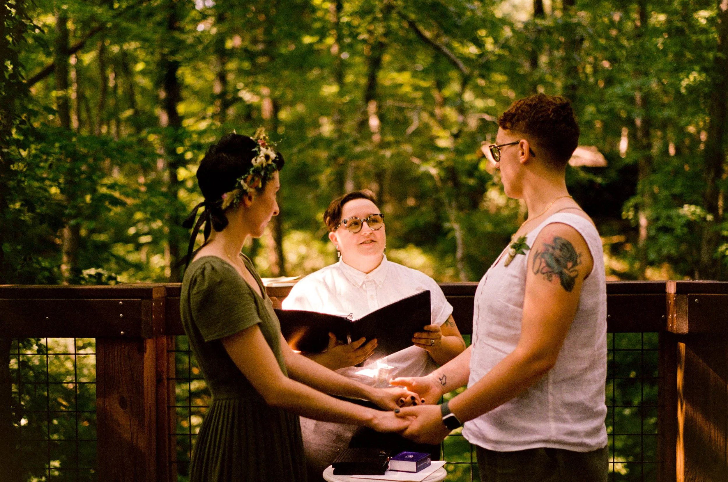 REW50-minister-speaking-over-lgbtq-wedding.jpg