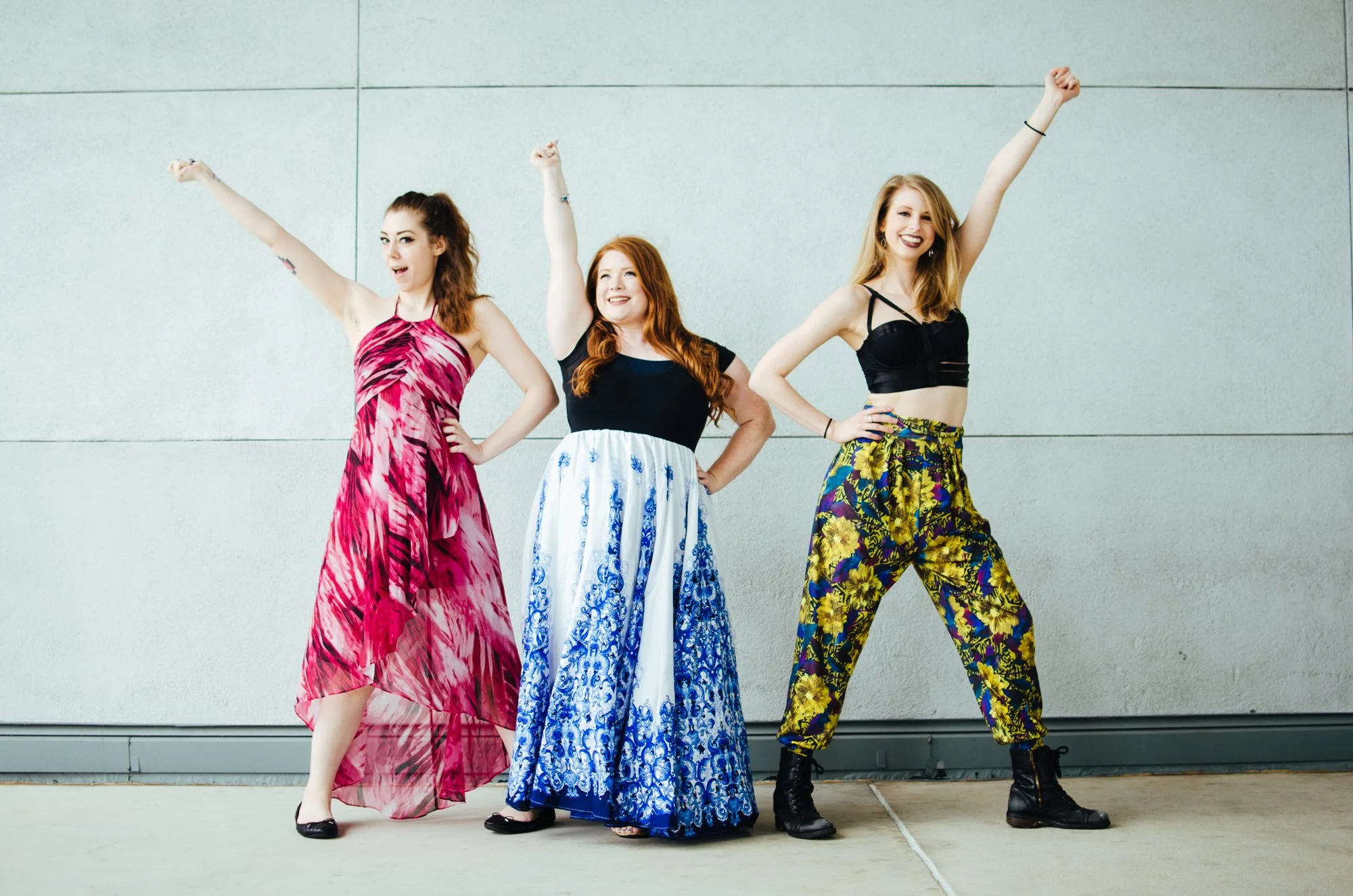 BT56-three-women-arms-up-hamilton-pose.jpg