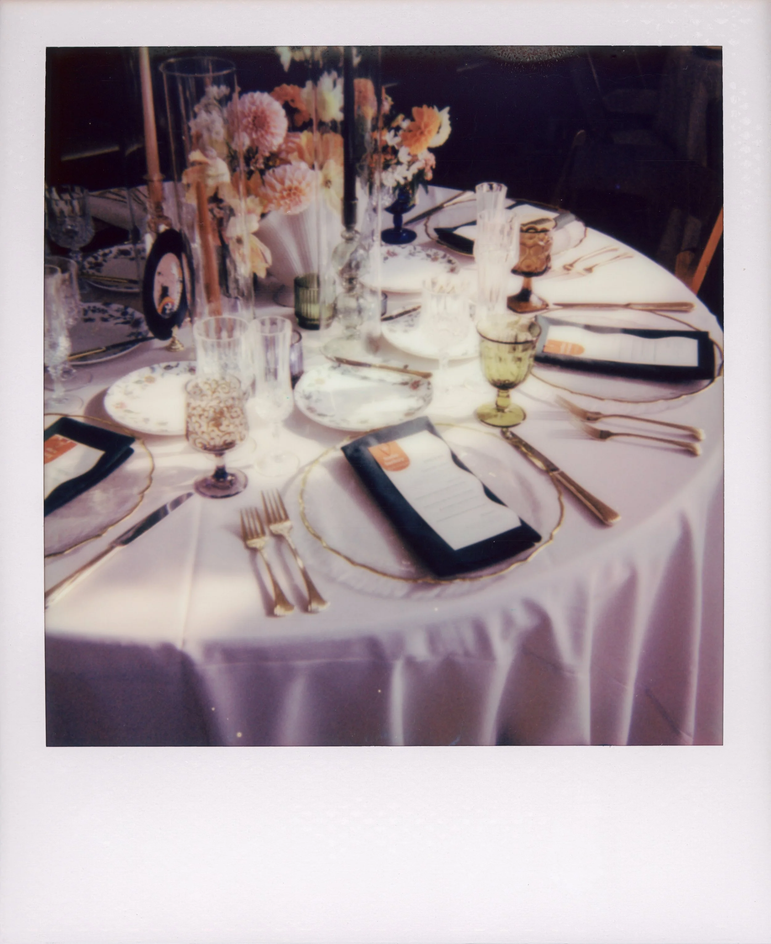 LBW74-wedding-reception-table-arrangement-polaroid.jpg