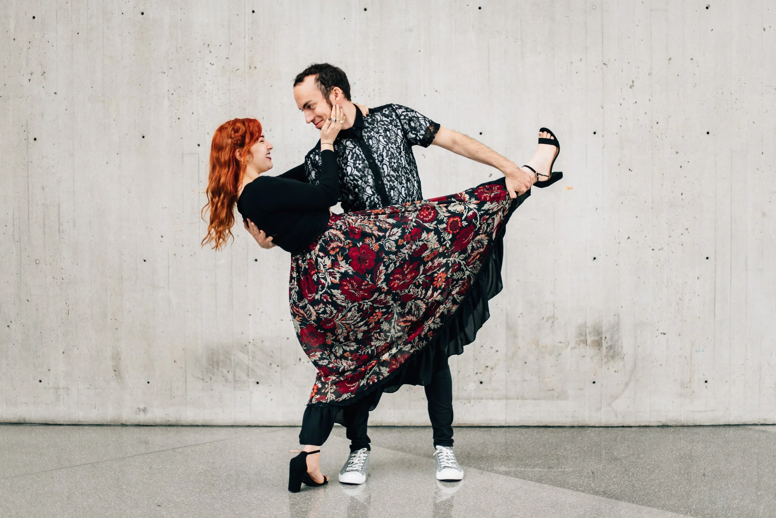 BT116-man-tipping-woman-leg-up.jpg