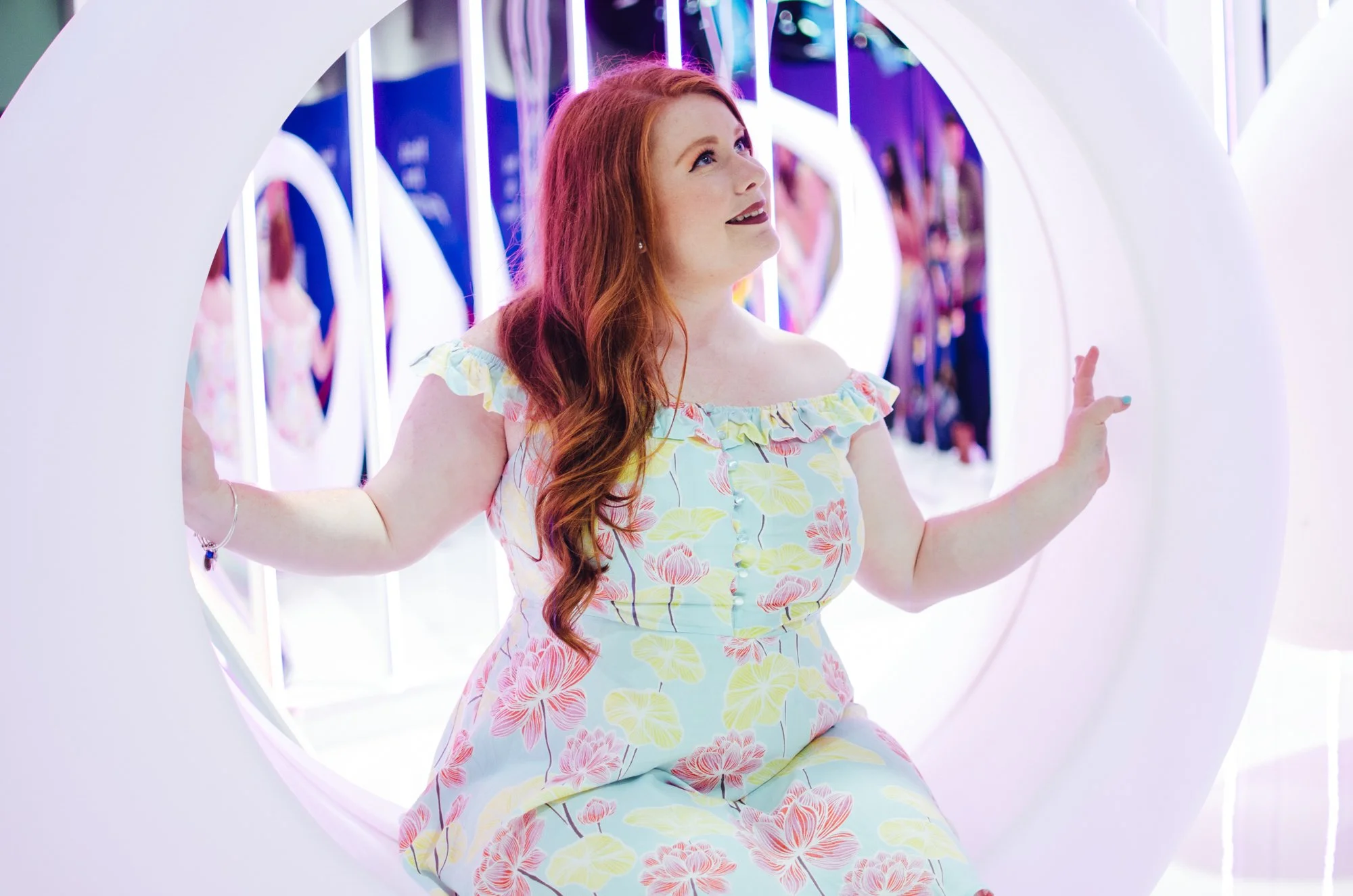 BT11-white-woman-red-hair-sitting-in-circle.jpg