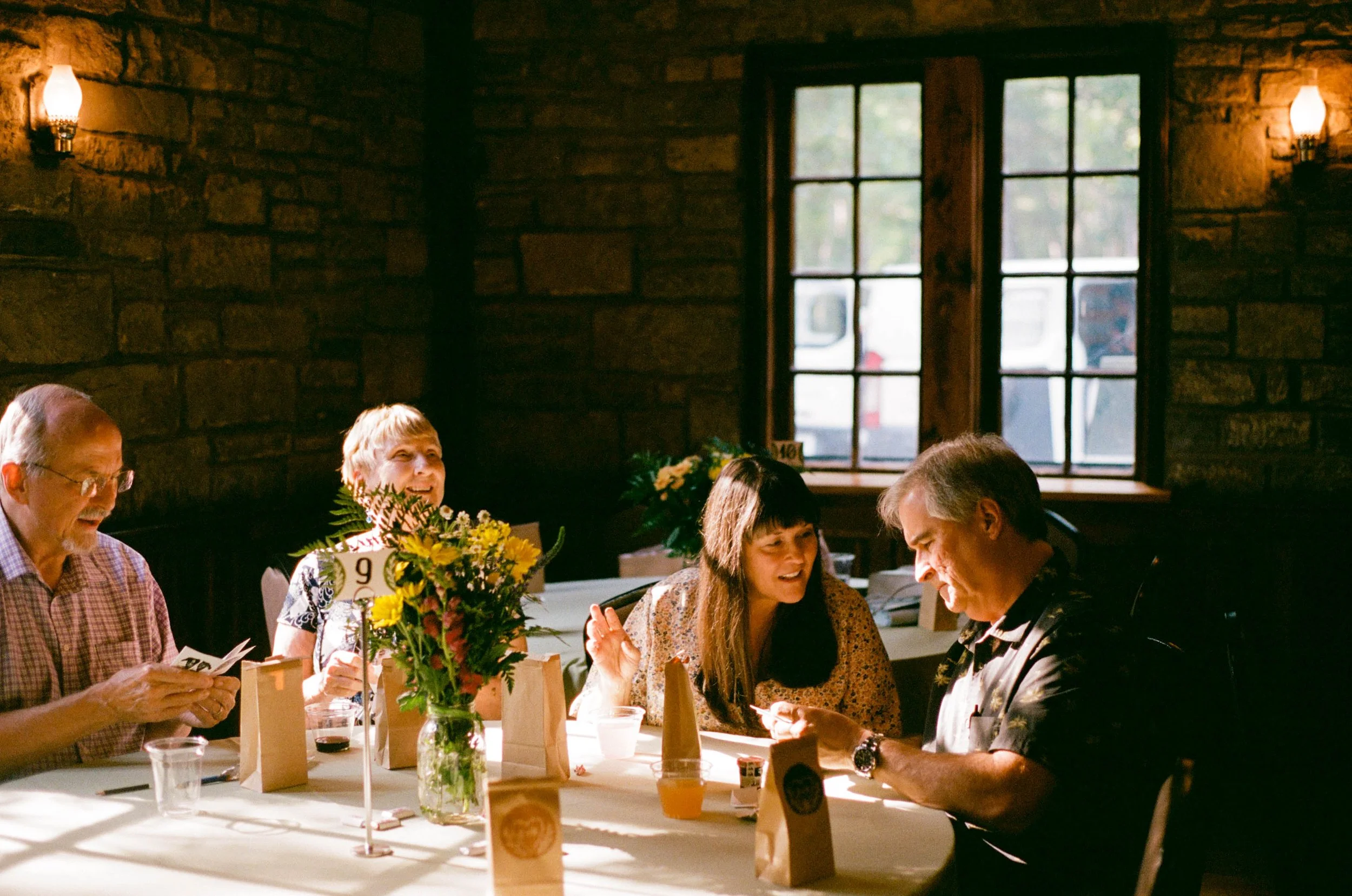 REW67-wedding-guests-at-table.jpg