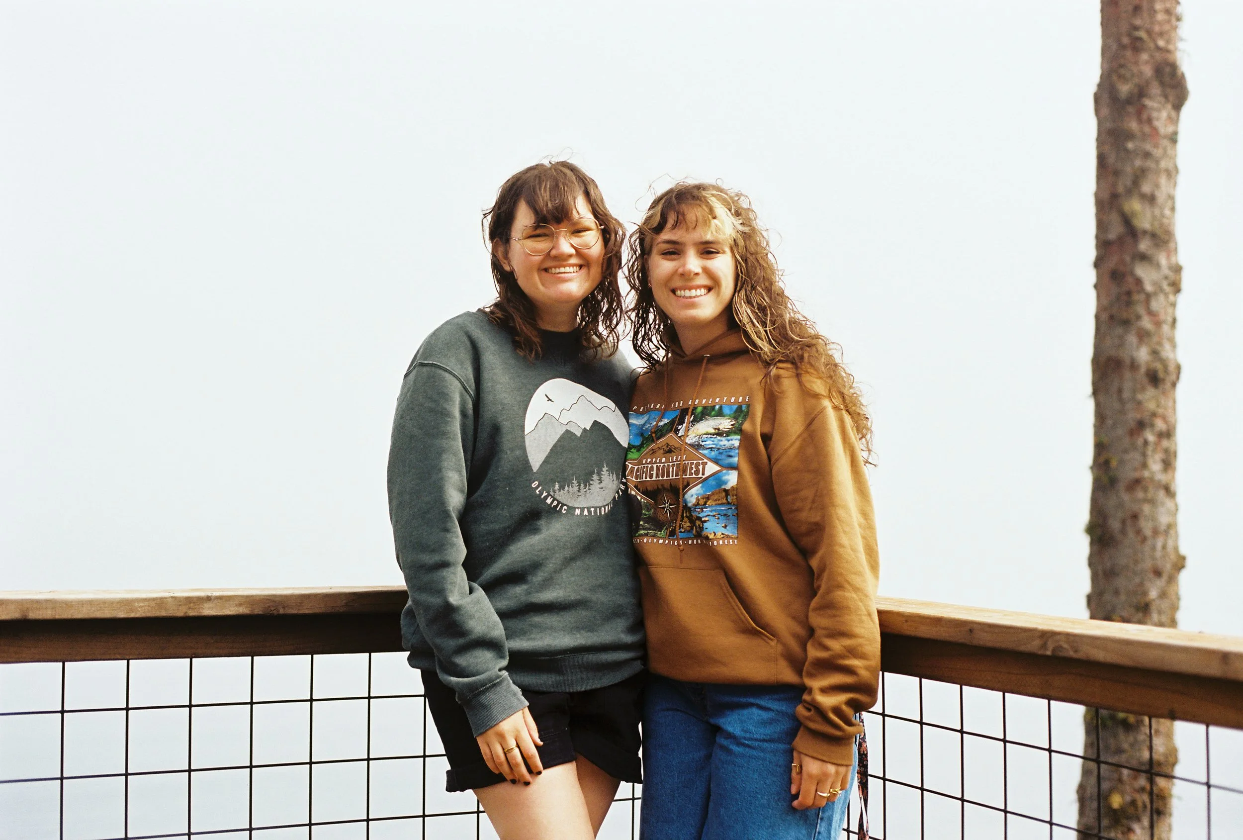 pnw171-two-women-in-sweatshirts-smiling.jpg