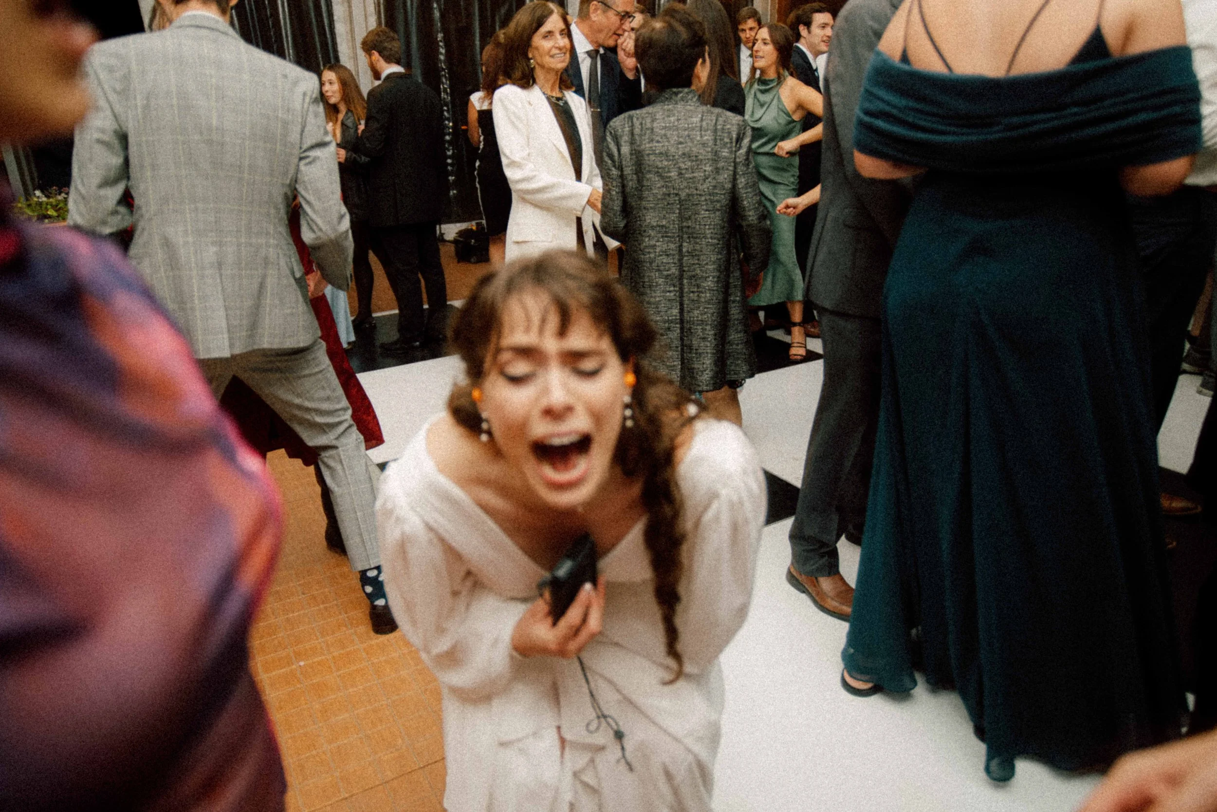 LBW141-bride-laughing-at-wedding-reception.jpg