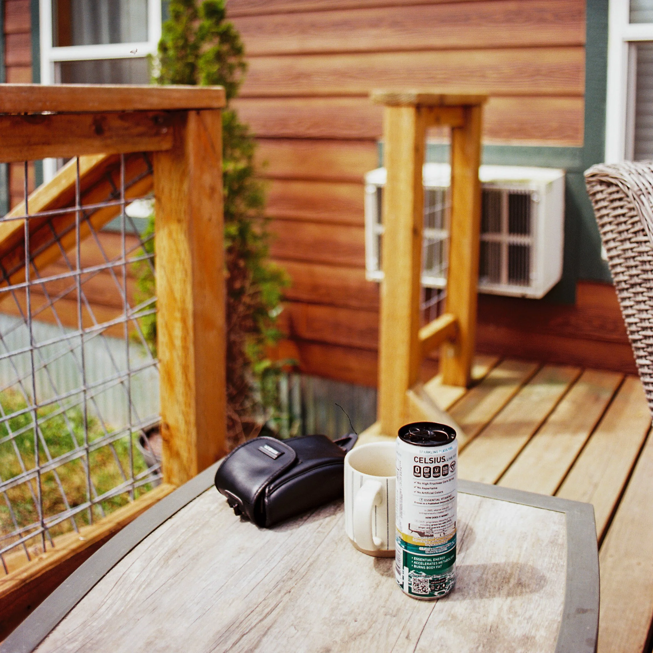 pnw143-celsius-mug-camera-on-table-at-cottage.jpg
