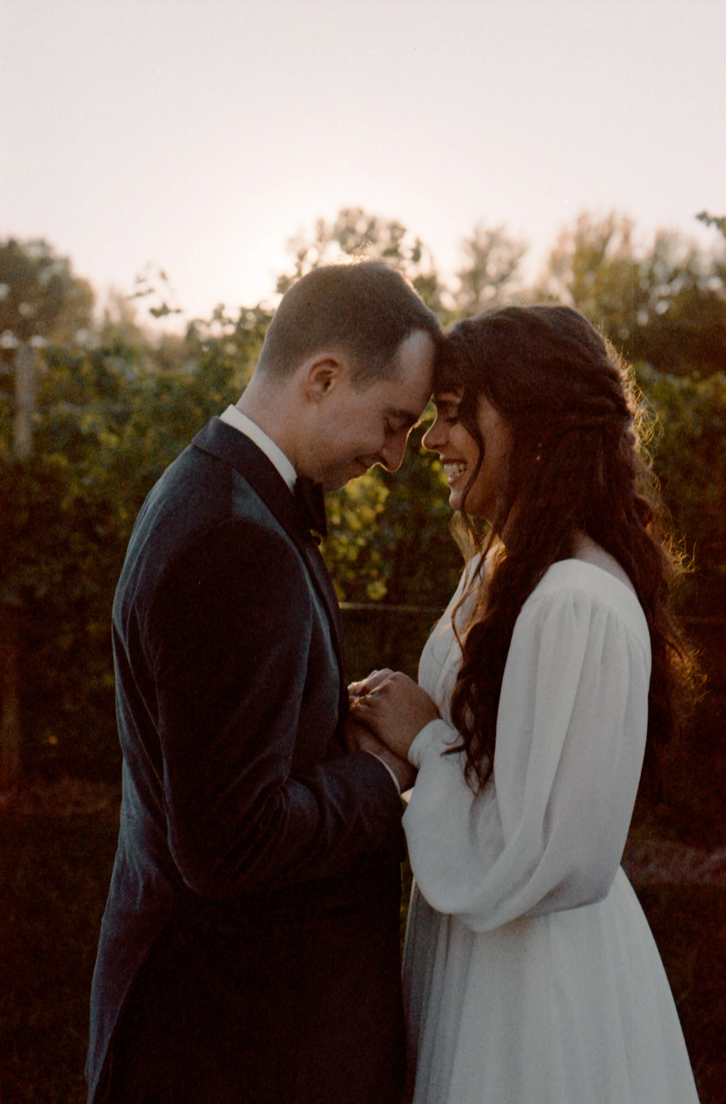 LBW98-wedding-couple-foreheads-together.jpg