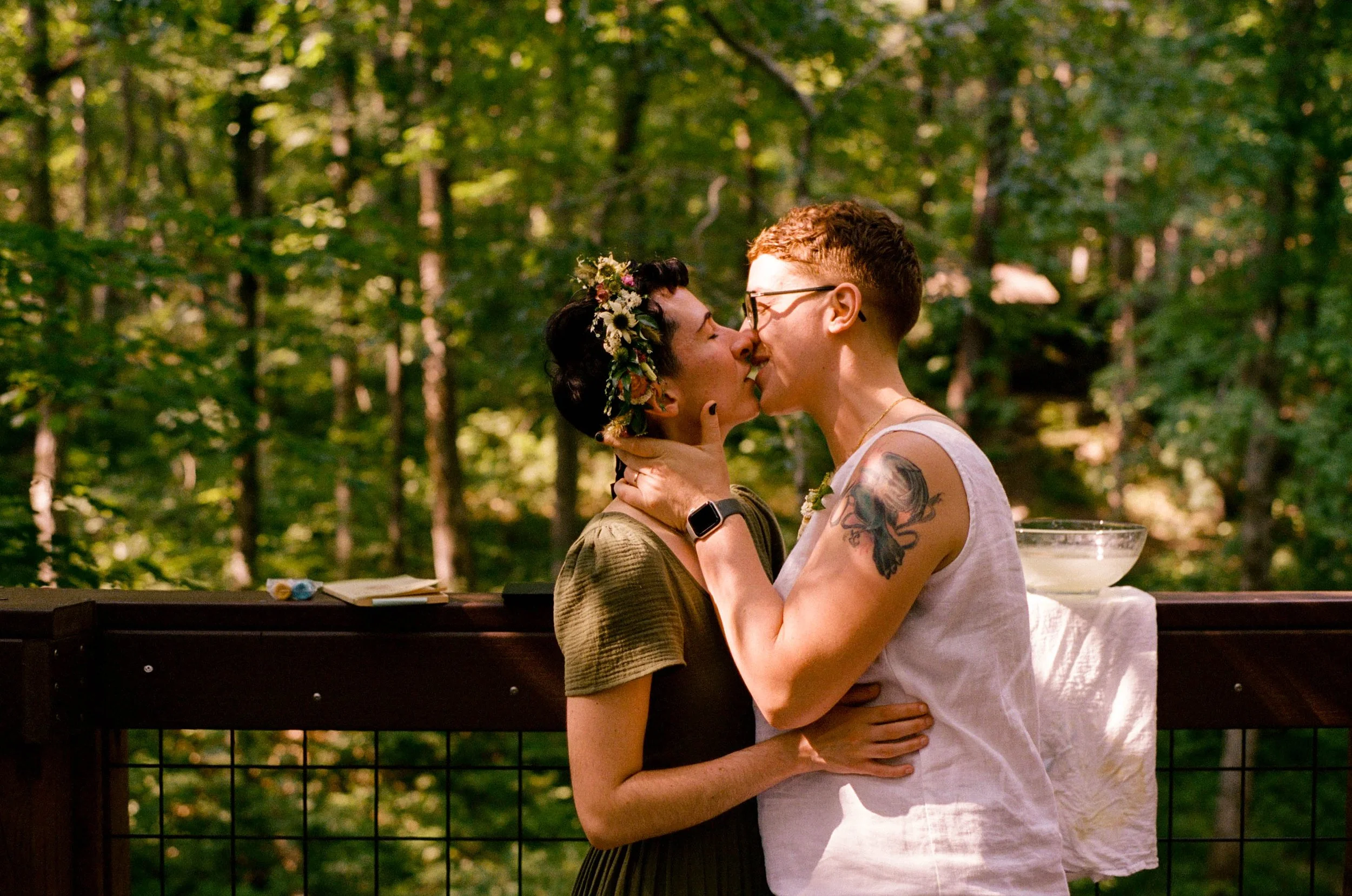 REW60-lgbtq-women-kissing-wedding-ceremony.jpg