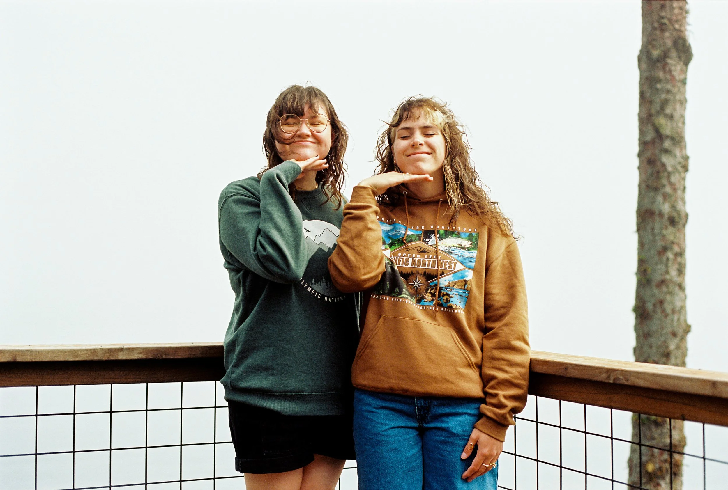 pnw172-two-women-in-sweatshirts-smiling.jpg