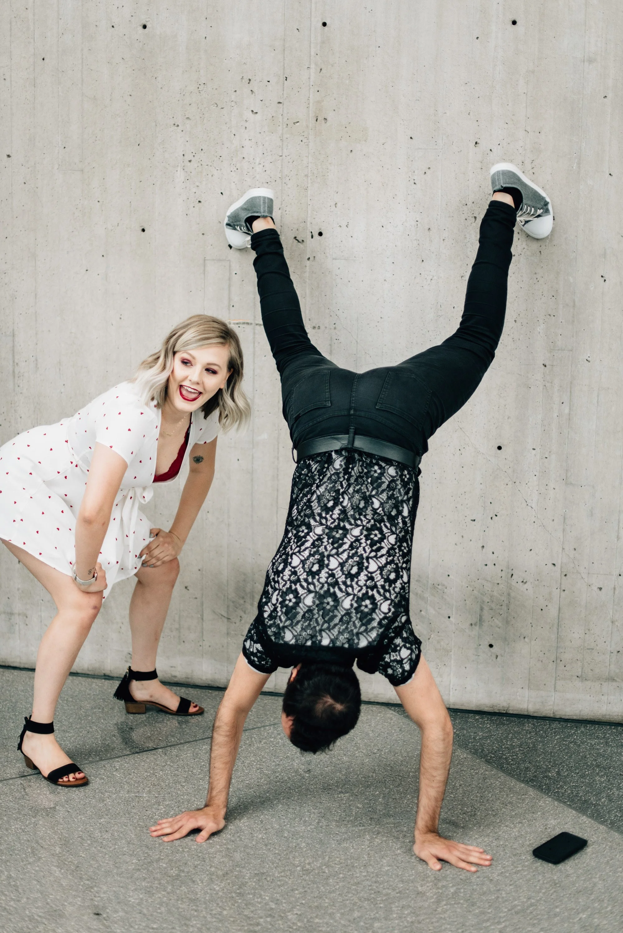 BT99-man-twerking-upside-down-with-woman.jpg