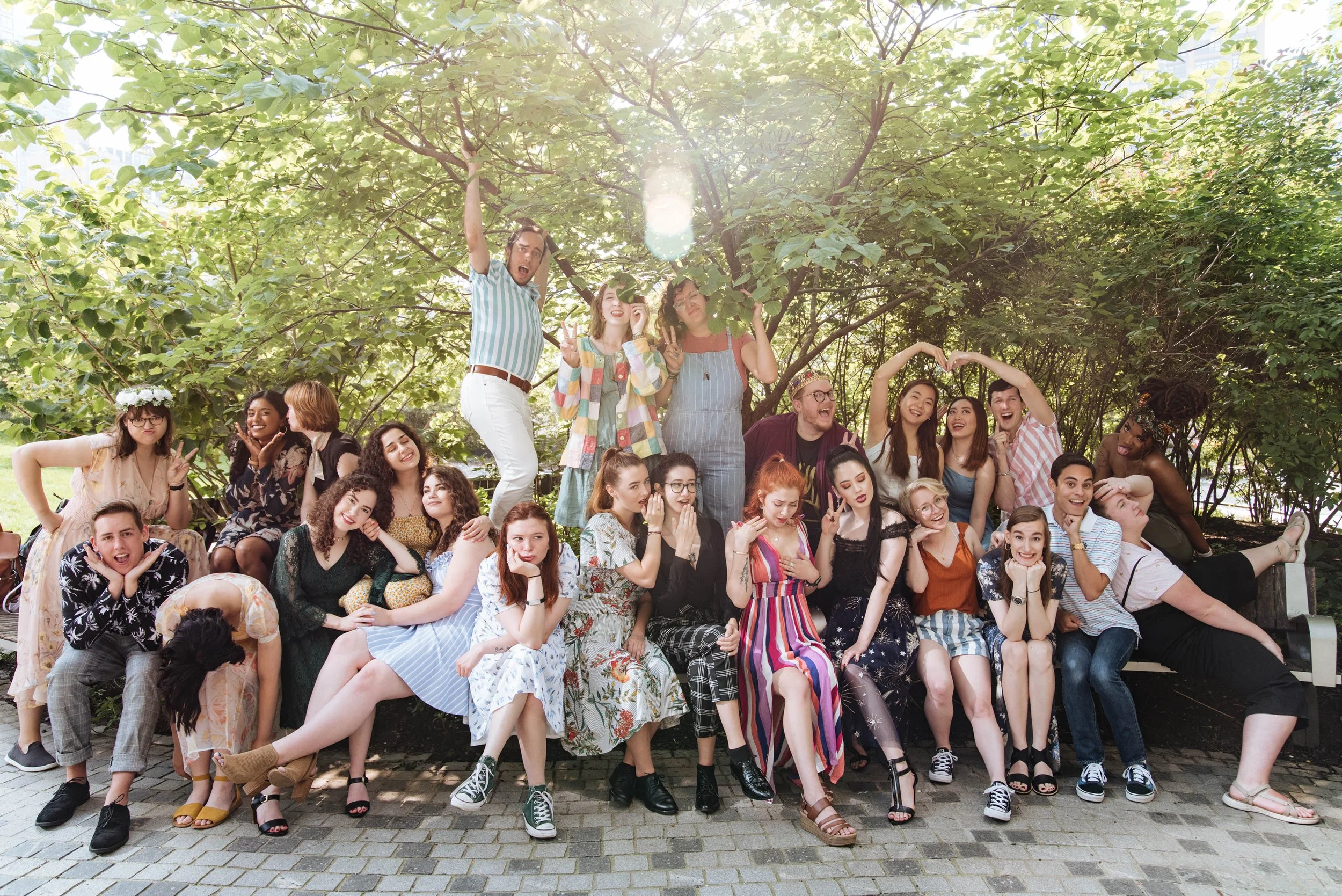 BT403-booktube-group-photo-sitting-under-trees-goofy.jpg