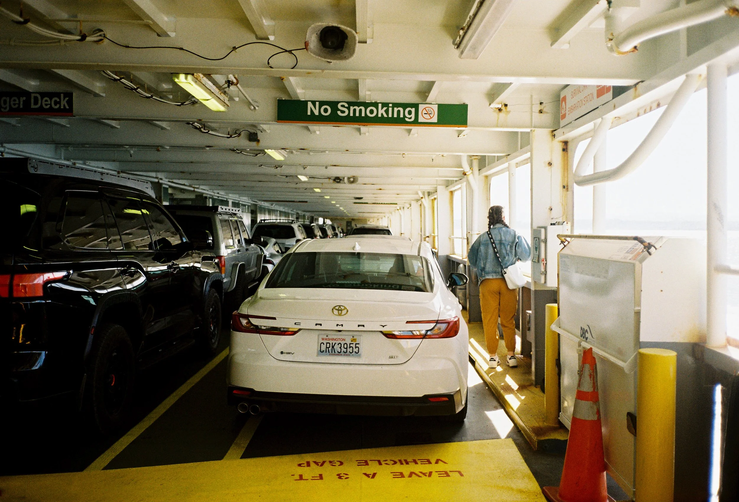 pnw215-cars-and-woman-on-seattle-ferry.jpg