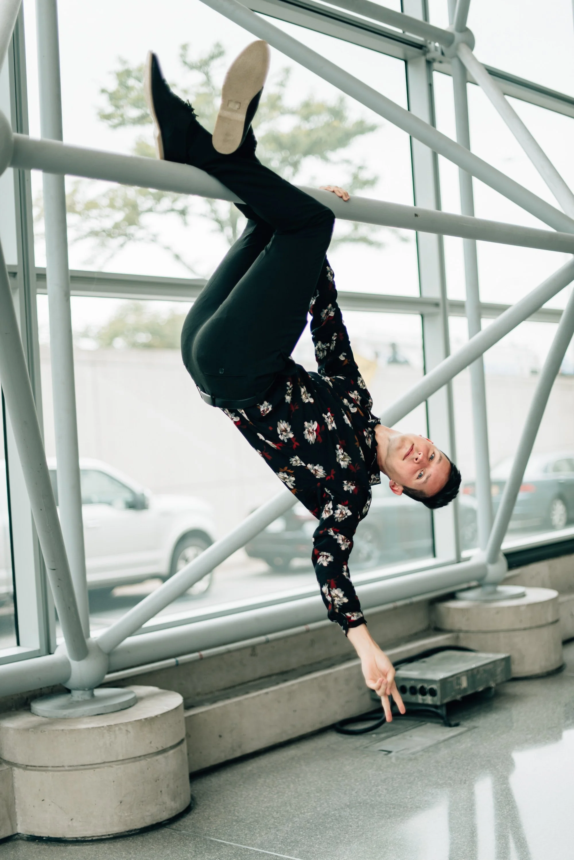 BT73-jessethereader-hanging-from-railing.jpg
