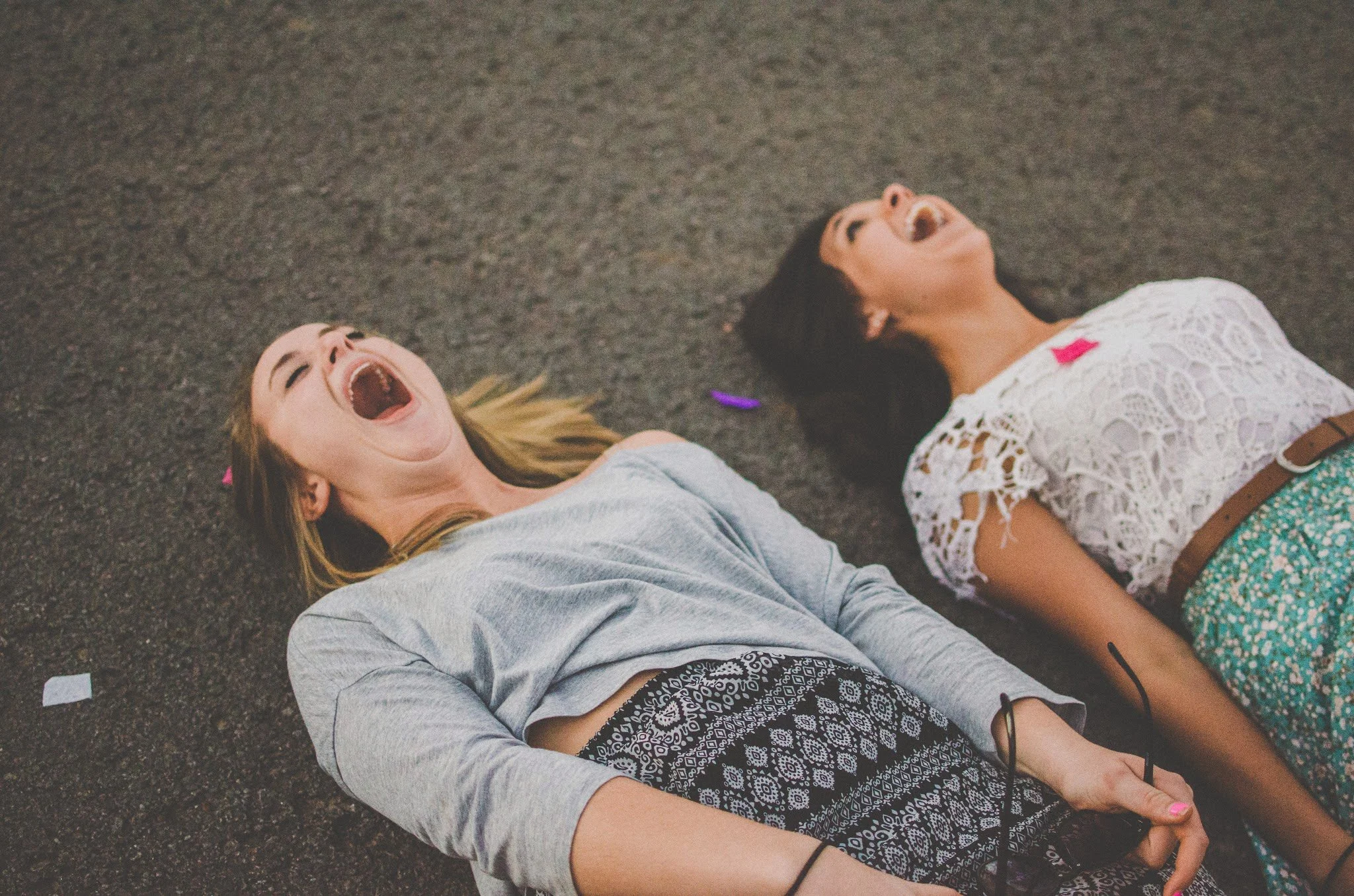 d18-women-on-ground-mouths-open.jpg