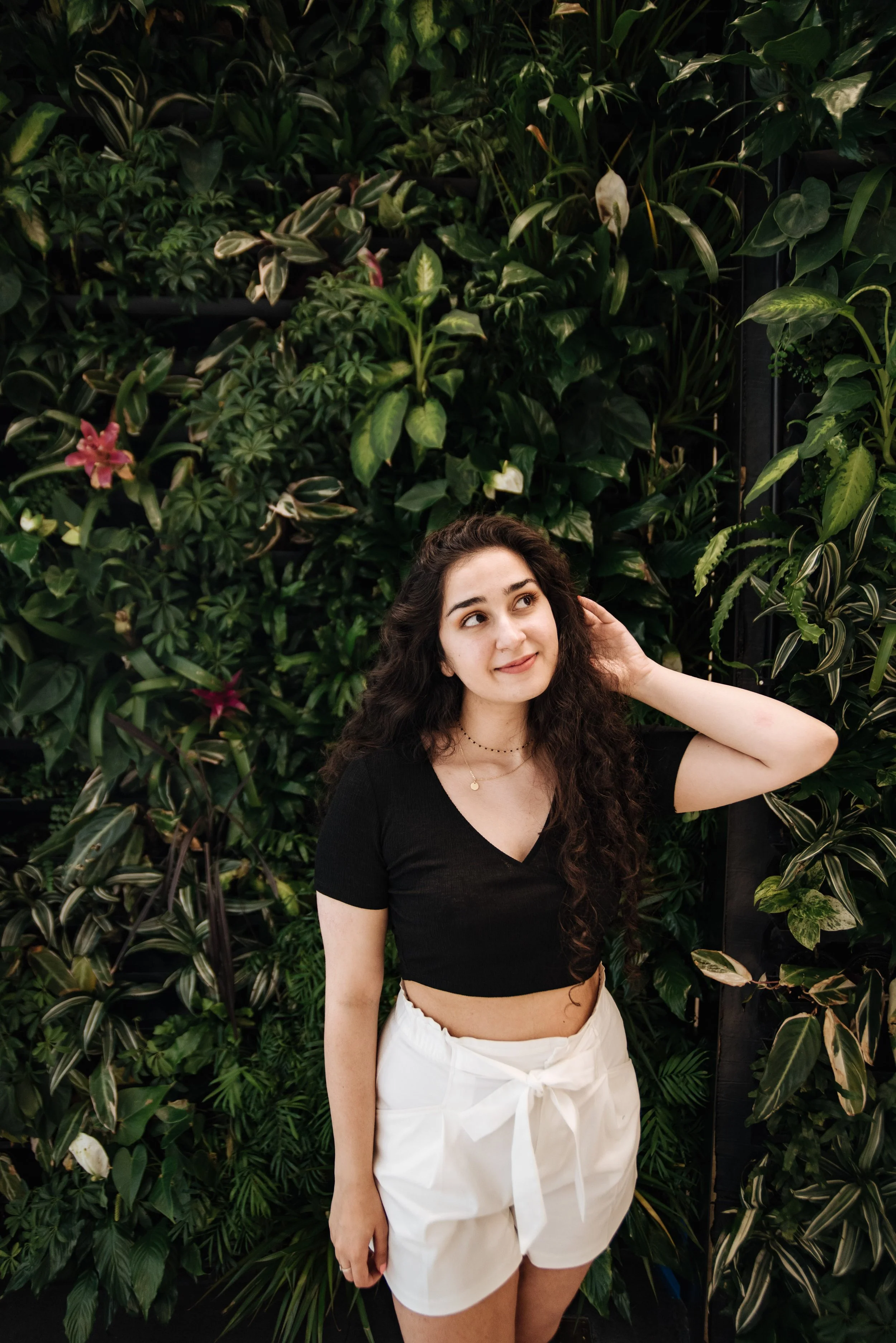 BT247-woman-posing-in-greenery-leaves.jpg