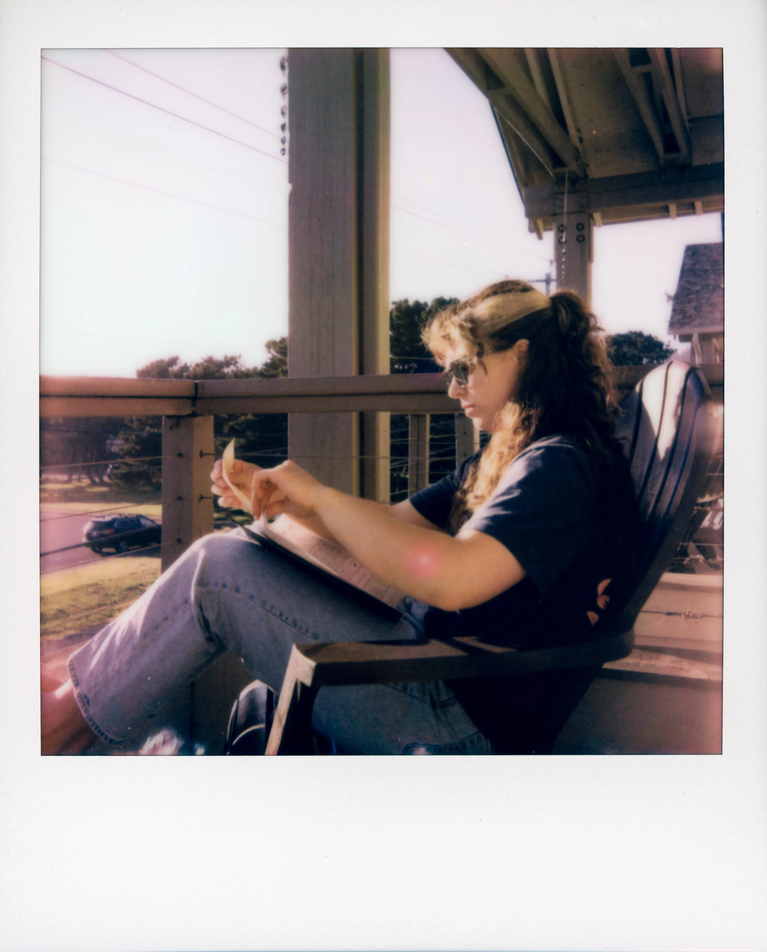 polaroid-woman-sitting-in-sun-wayside-inn-cannon-beach.jpg