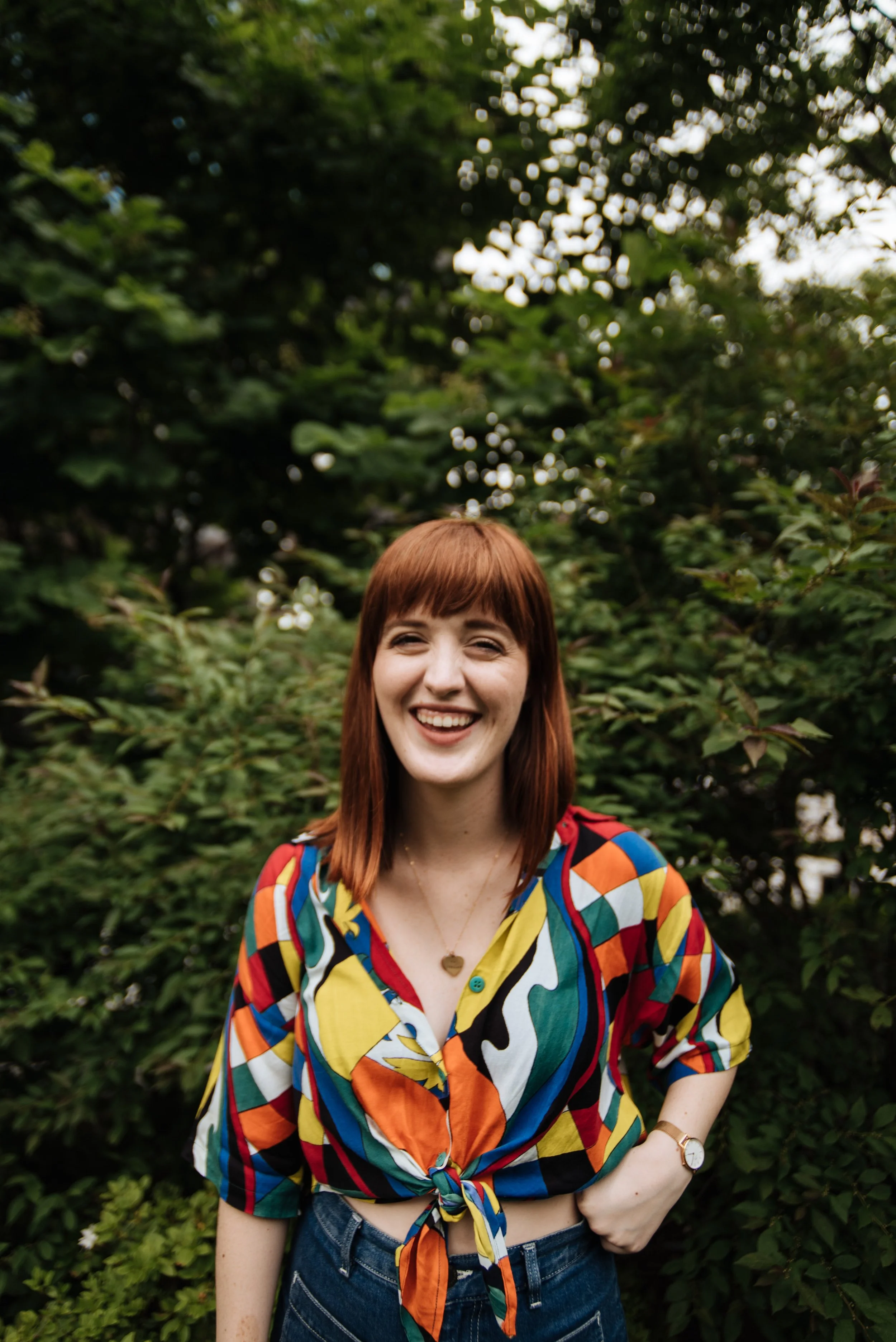 BT373-woman-rainbow-shirt-fringe-hair.jpg